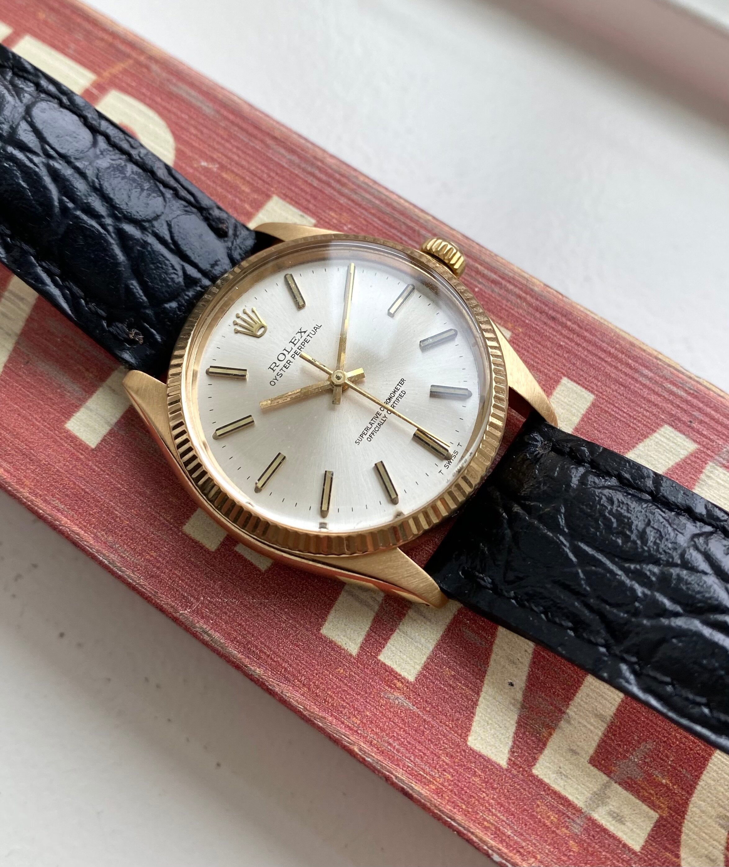 Rolex Oyster Perpetual Date ref. 1005 — 18K Yellow Gold