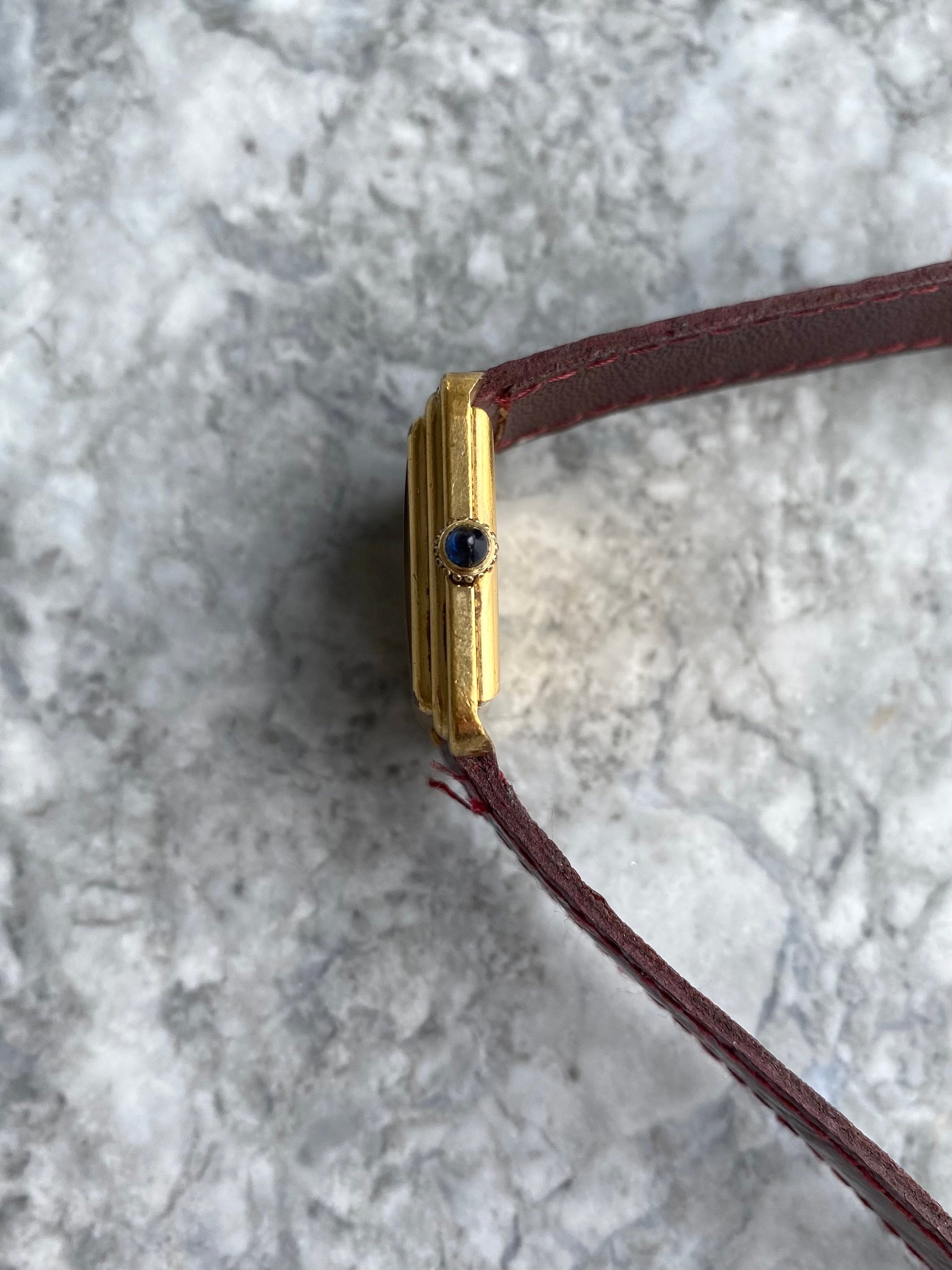 Cartier Stepped Case - Brown Roman Numerals.
