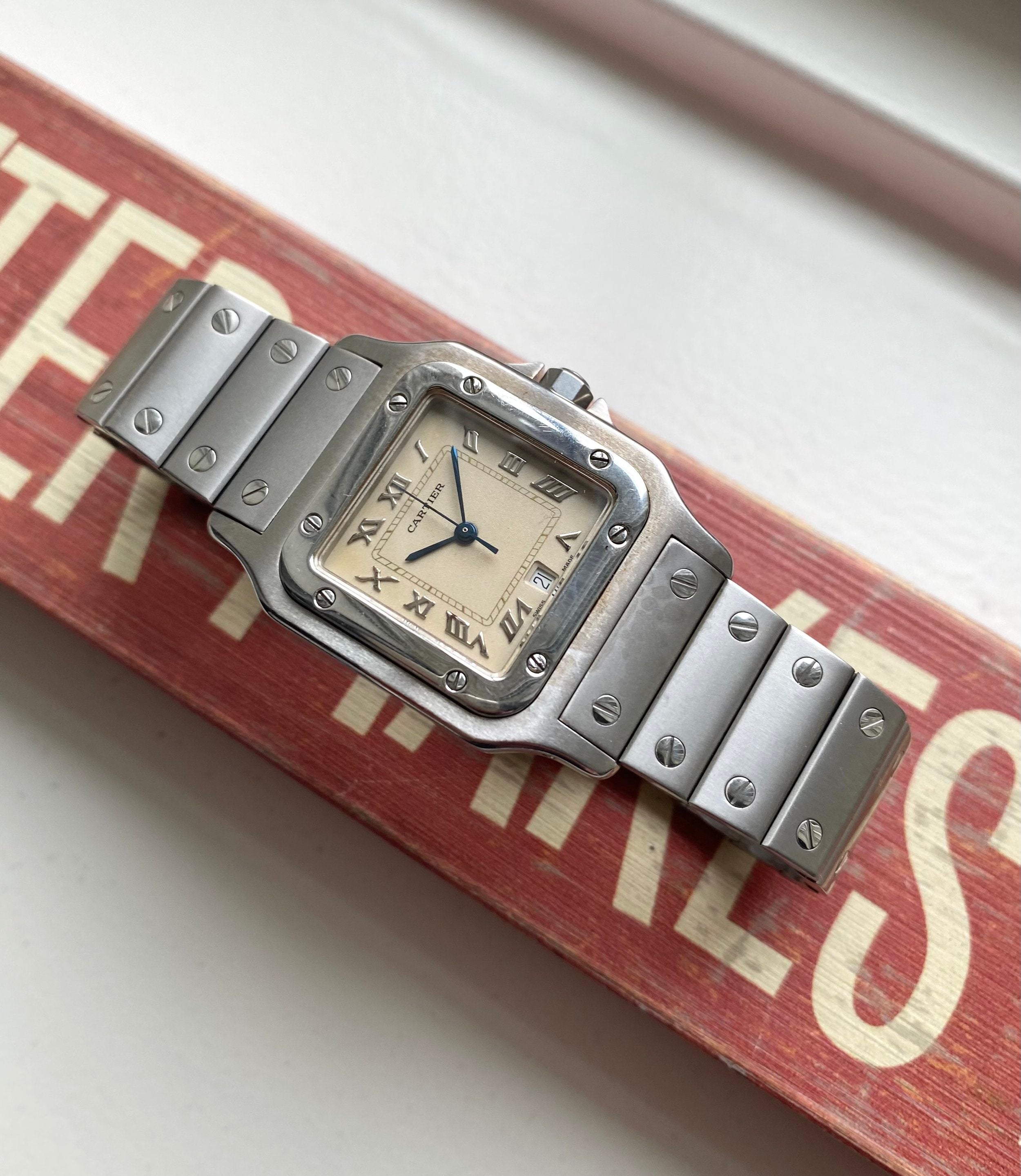 Cartier Santos ref. 1564 — Cream Roman Numeral Dial