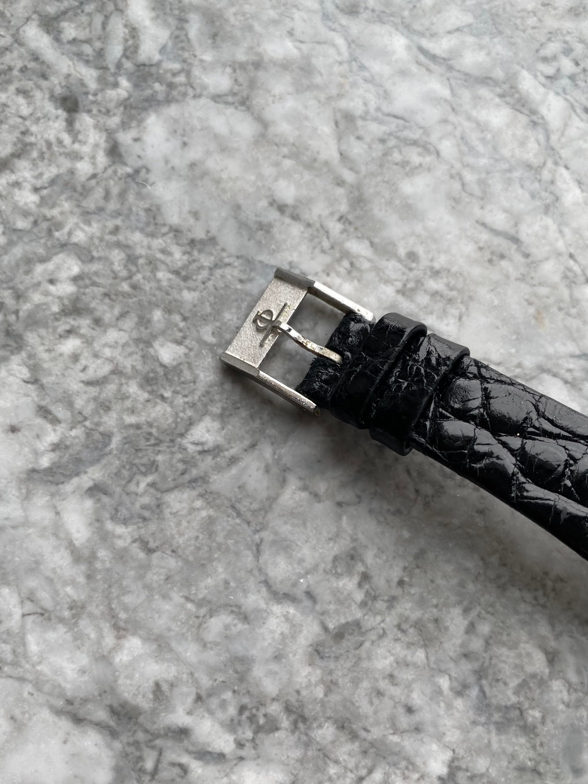 Baume & Mercier - 18K White Gold Onyx.