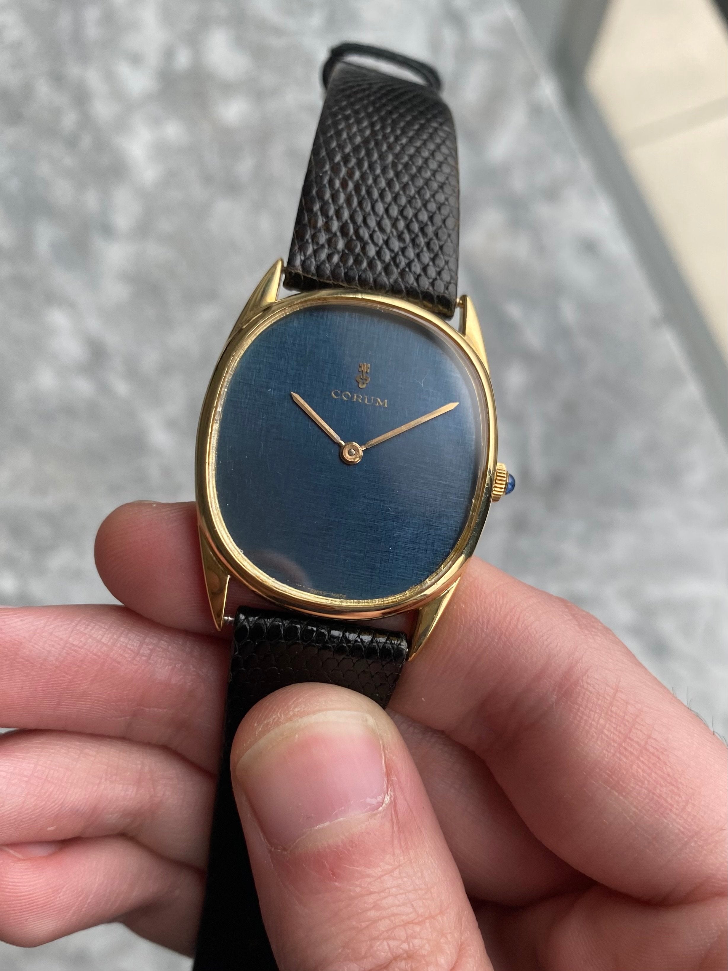 Corum 18K Gold - Blue Linen Dial