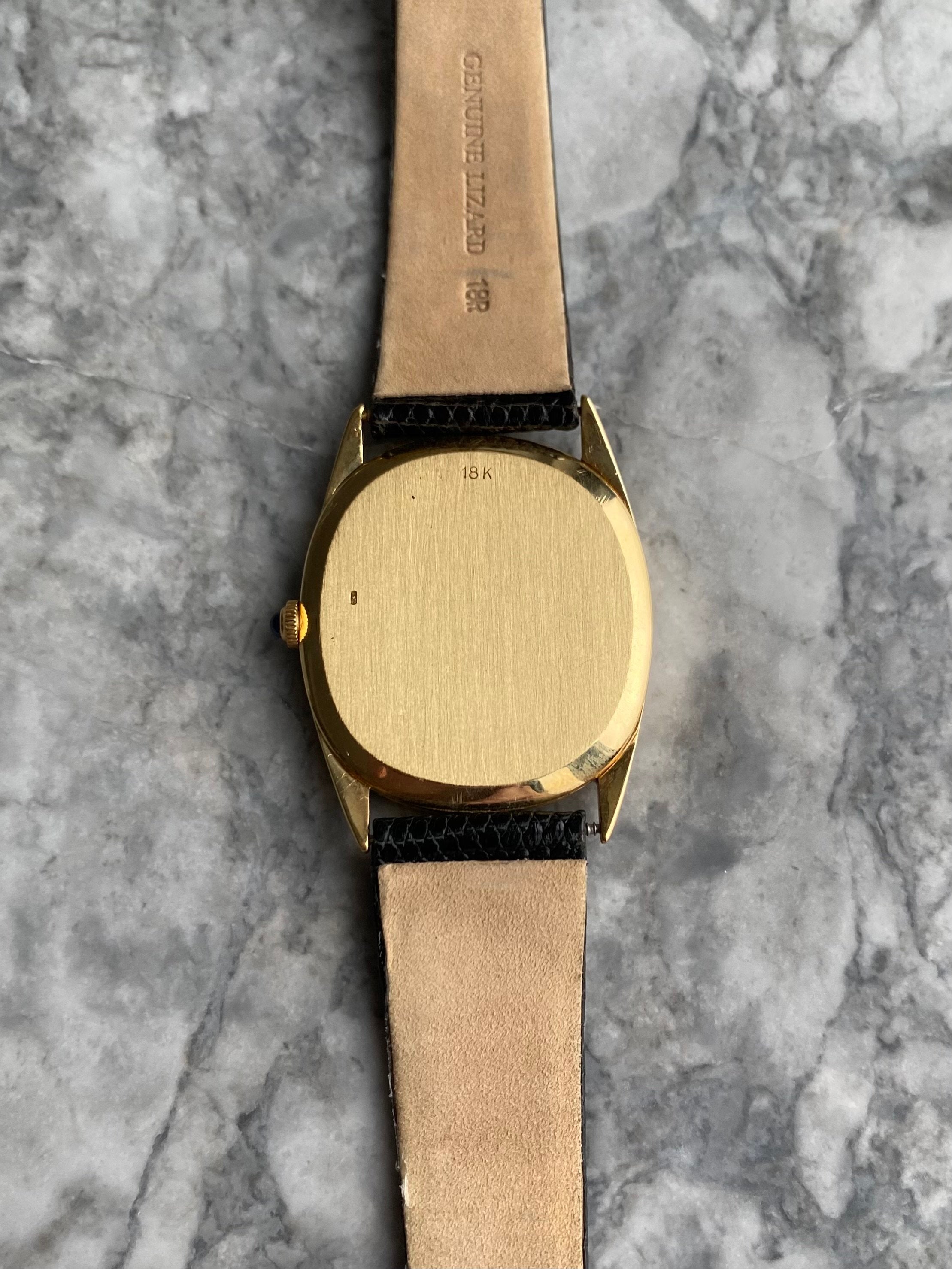 Corum 18K Gold - Blue Linen Dial