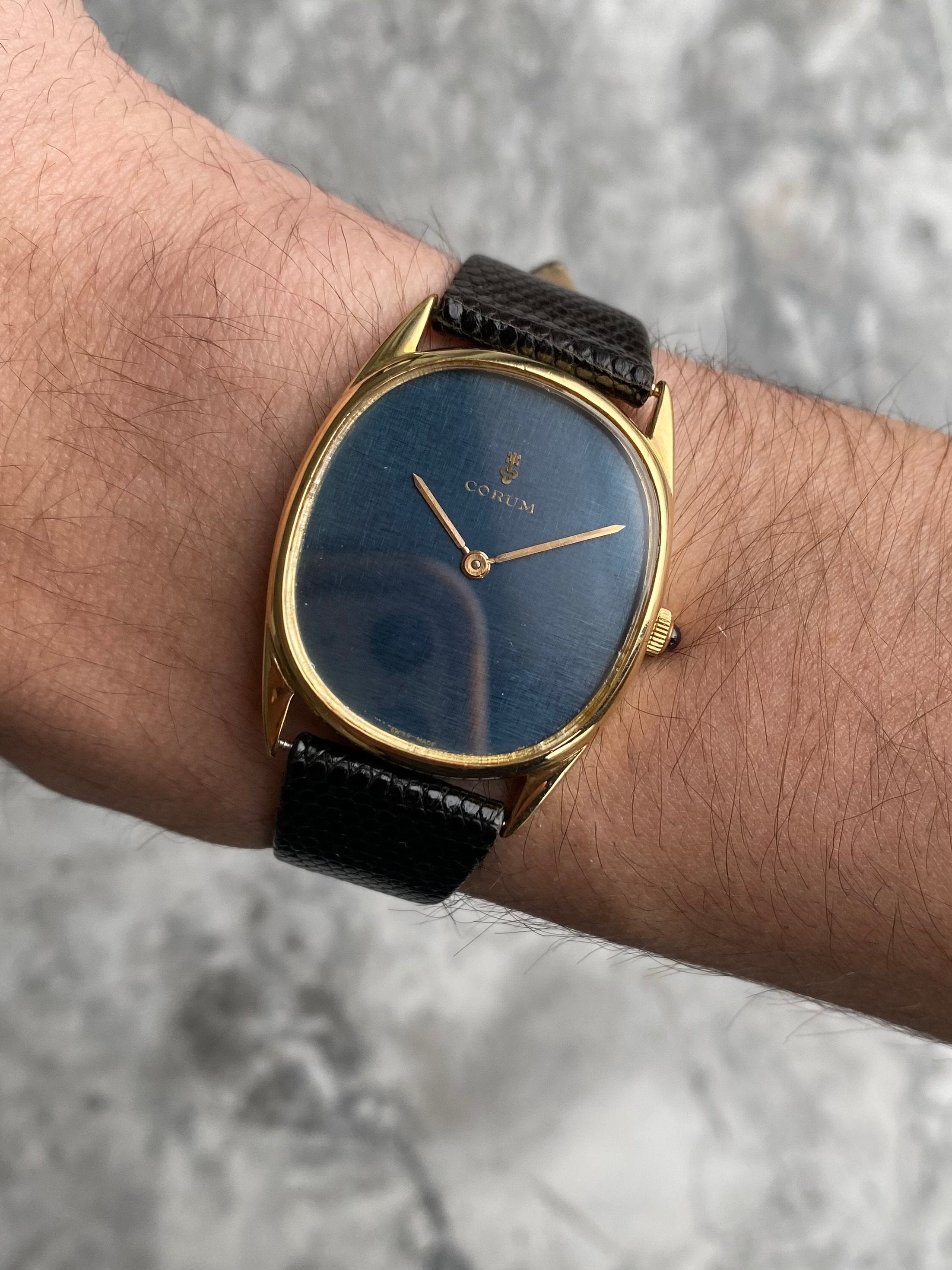 Corum 18K Gold - Blue Linen Dial