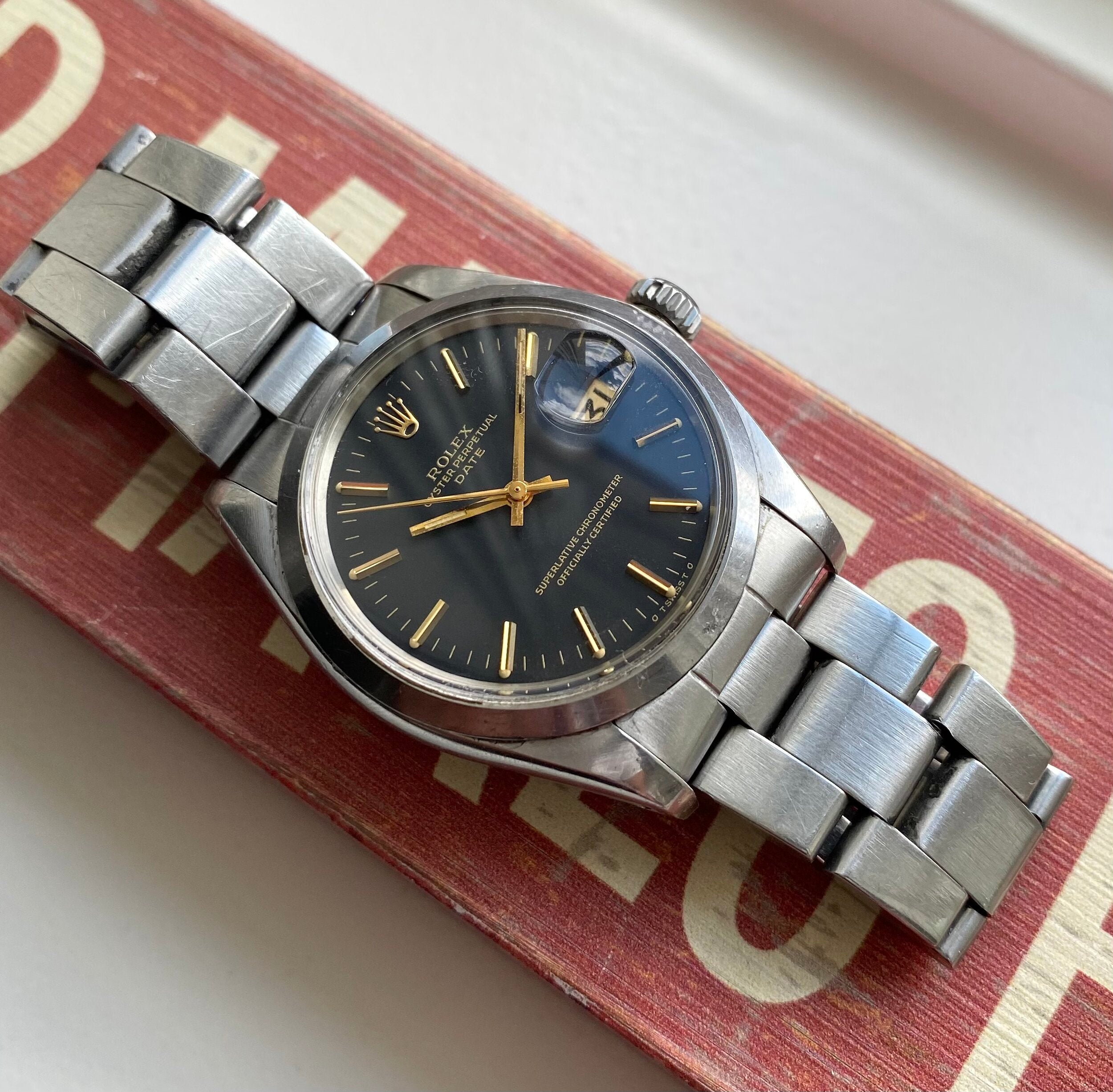 Rolex Oyster Perpetual Date ref. 1500 — Black Sigma Dial