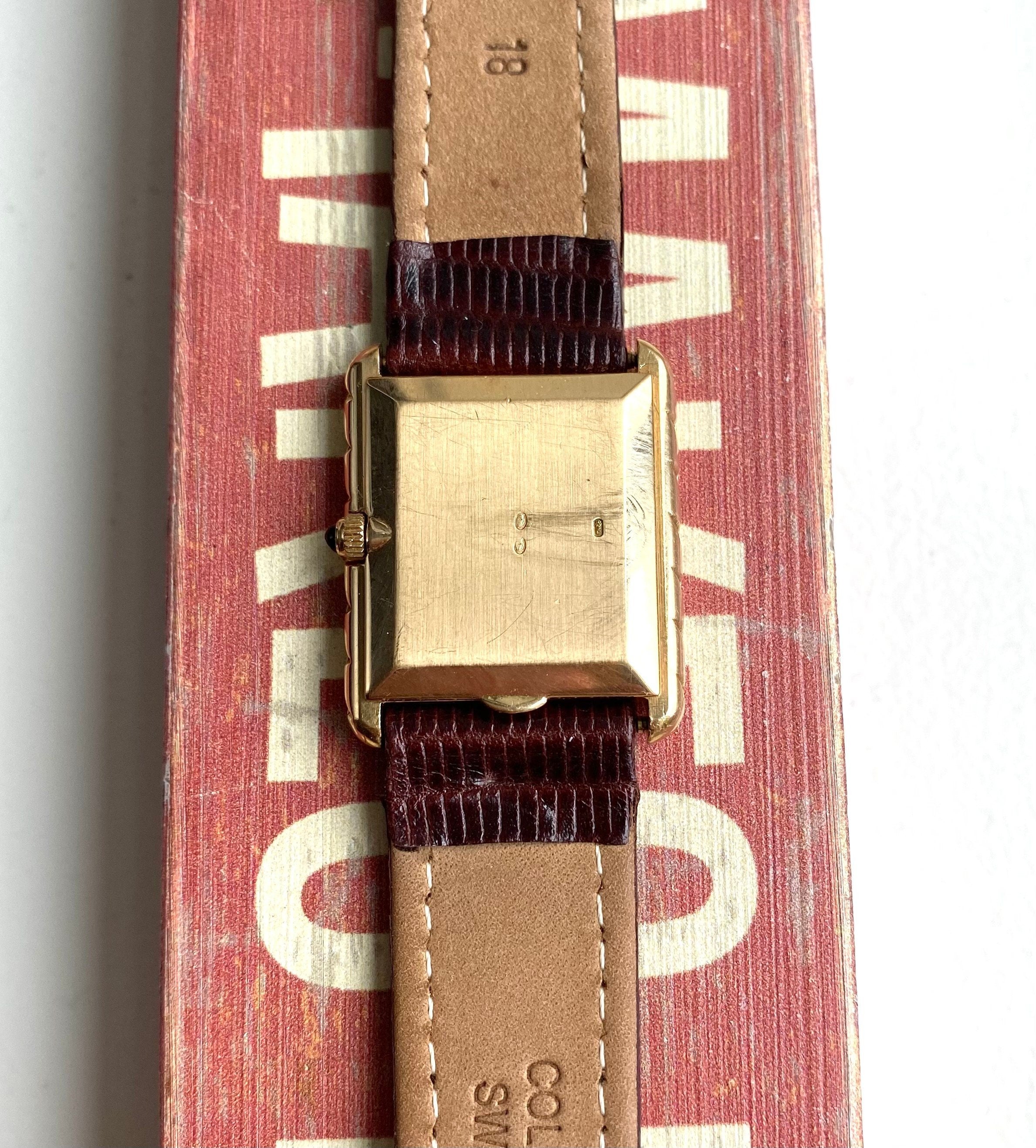 Vintage Patek Philippe Ref 4386 70s 18K Yellow Gold Tank Black Dial Manual Wind Watch