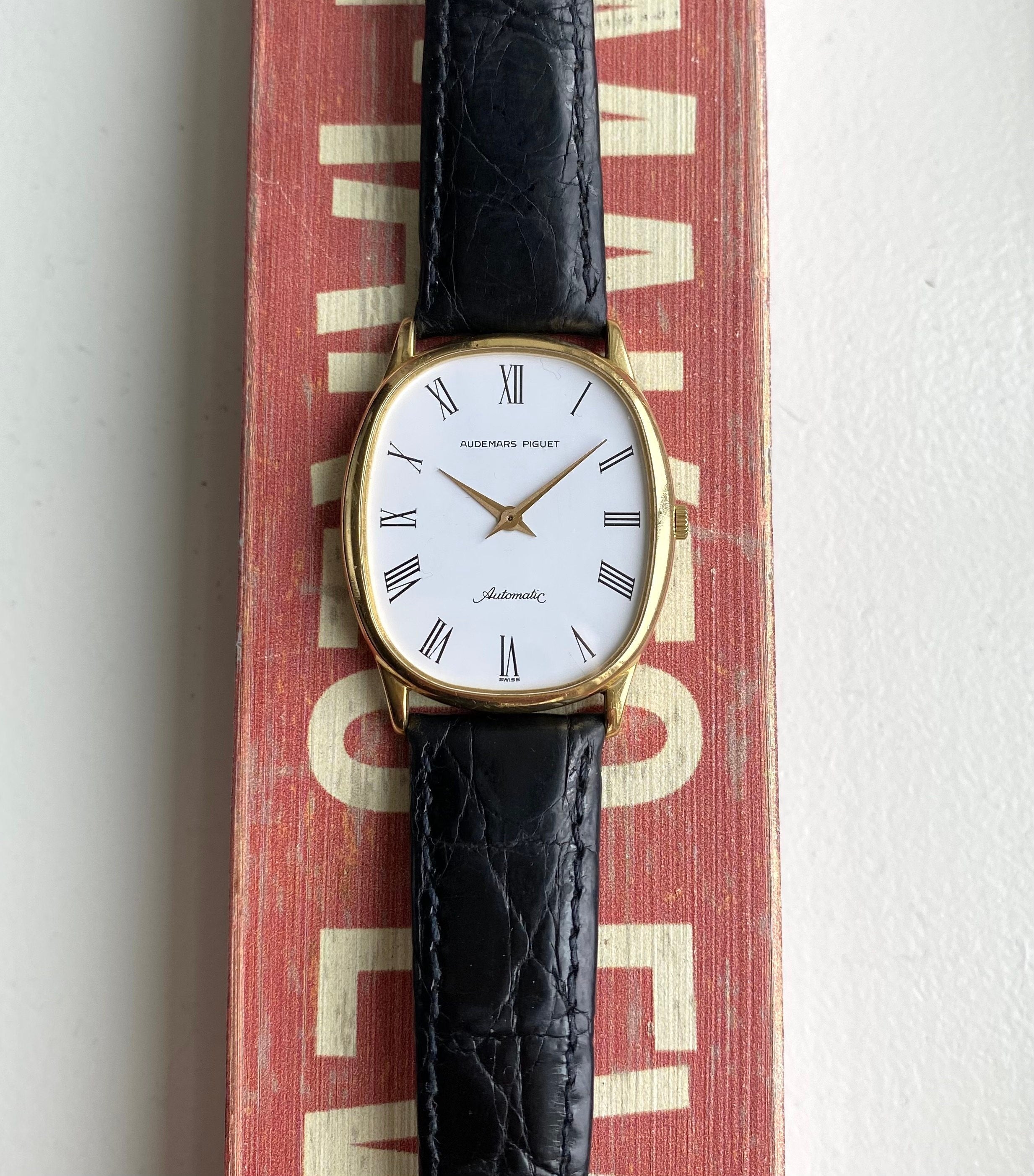 Vintage Audemars Piguet 70s Automatic 18K Yellow Gold Tank White Roman Dial Watch