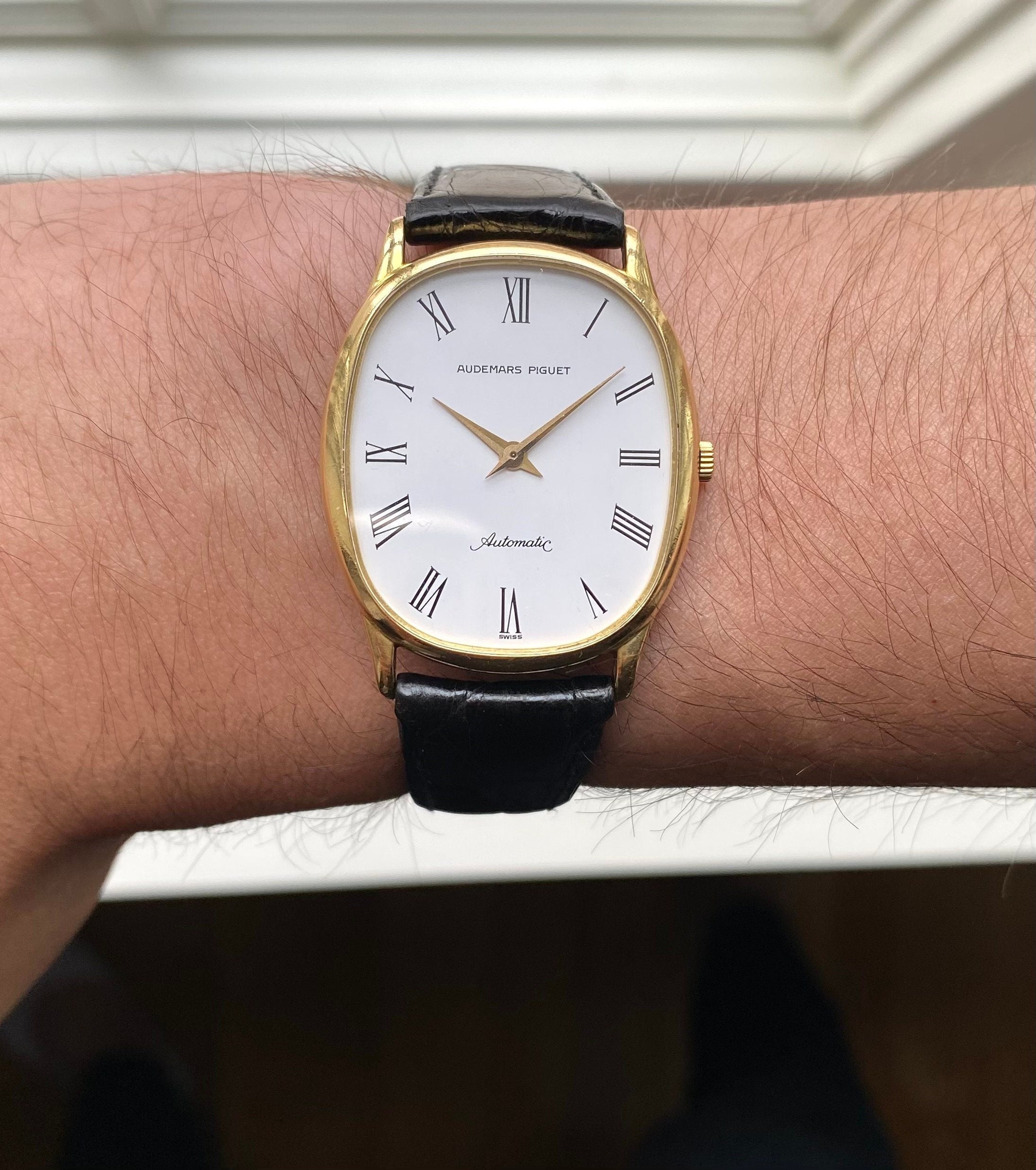 Vintage Audemars Piguet 70s Automatic 18K Yellow Gold Tank White Roman Dial Watch