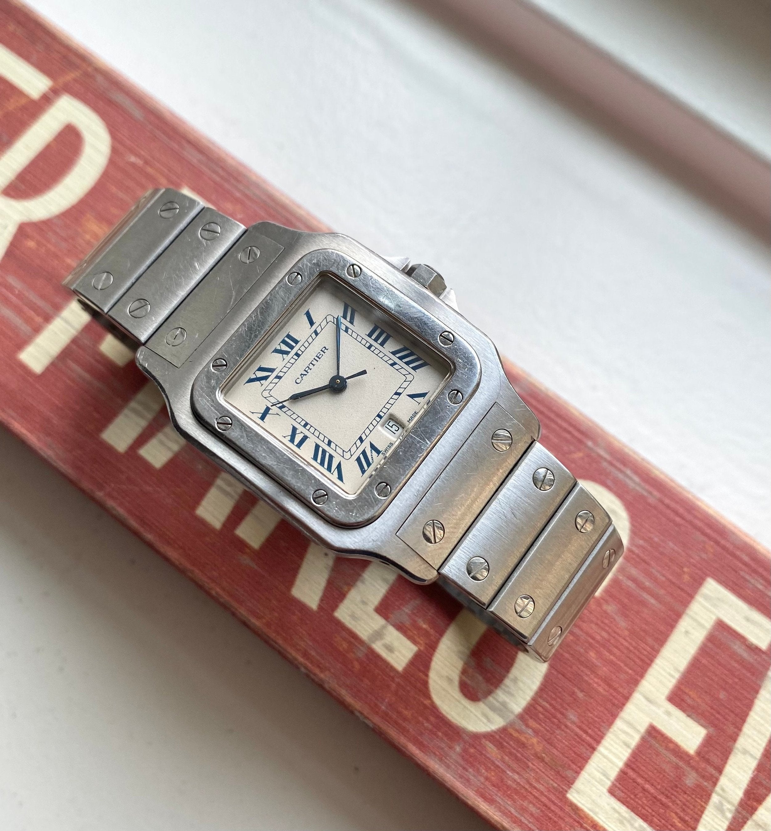 Vintage Cartier Santos 80s Quartz White Blue Roman Numeral Dial Steel Watch