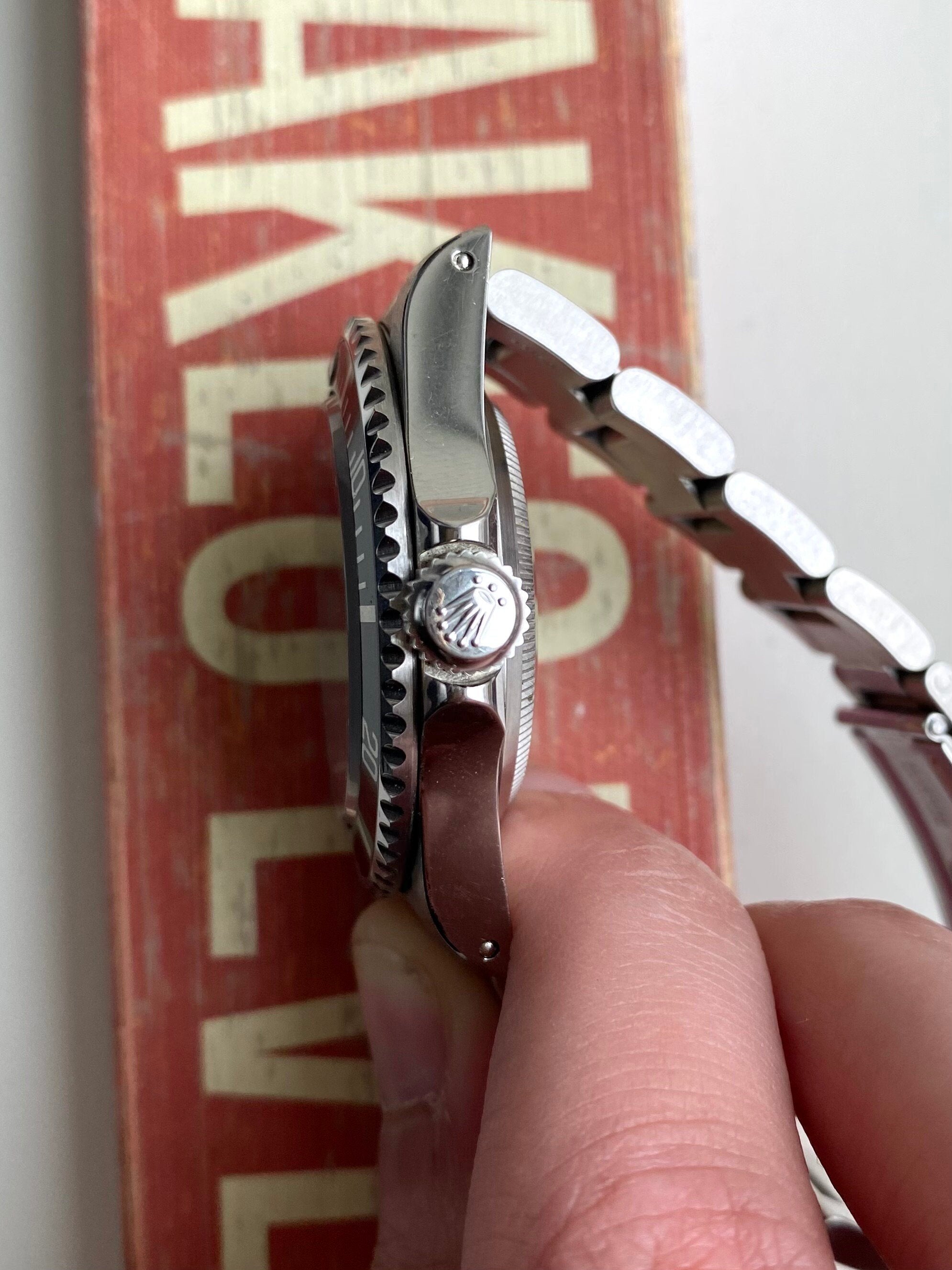 Rolex Submariner Reference 14060 1995 40mm Automatic Black Dial T serial Watch