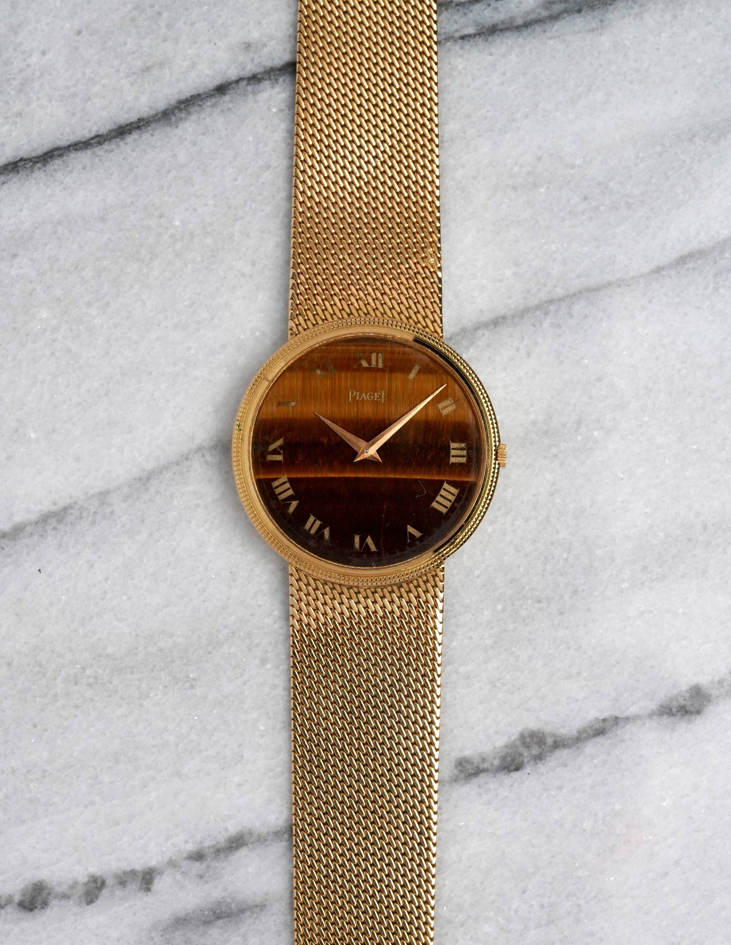 Piaget 18K Gold - Tiger Eye Dial.