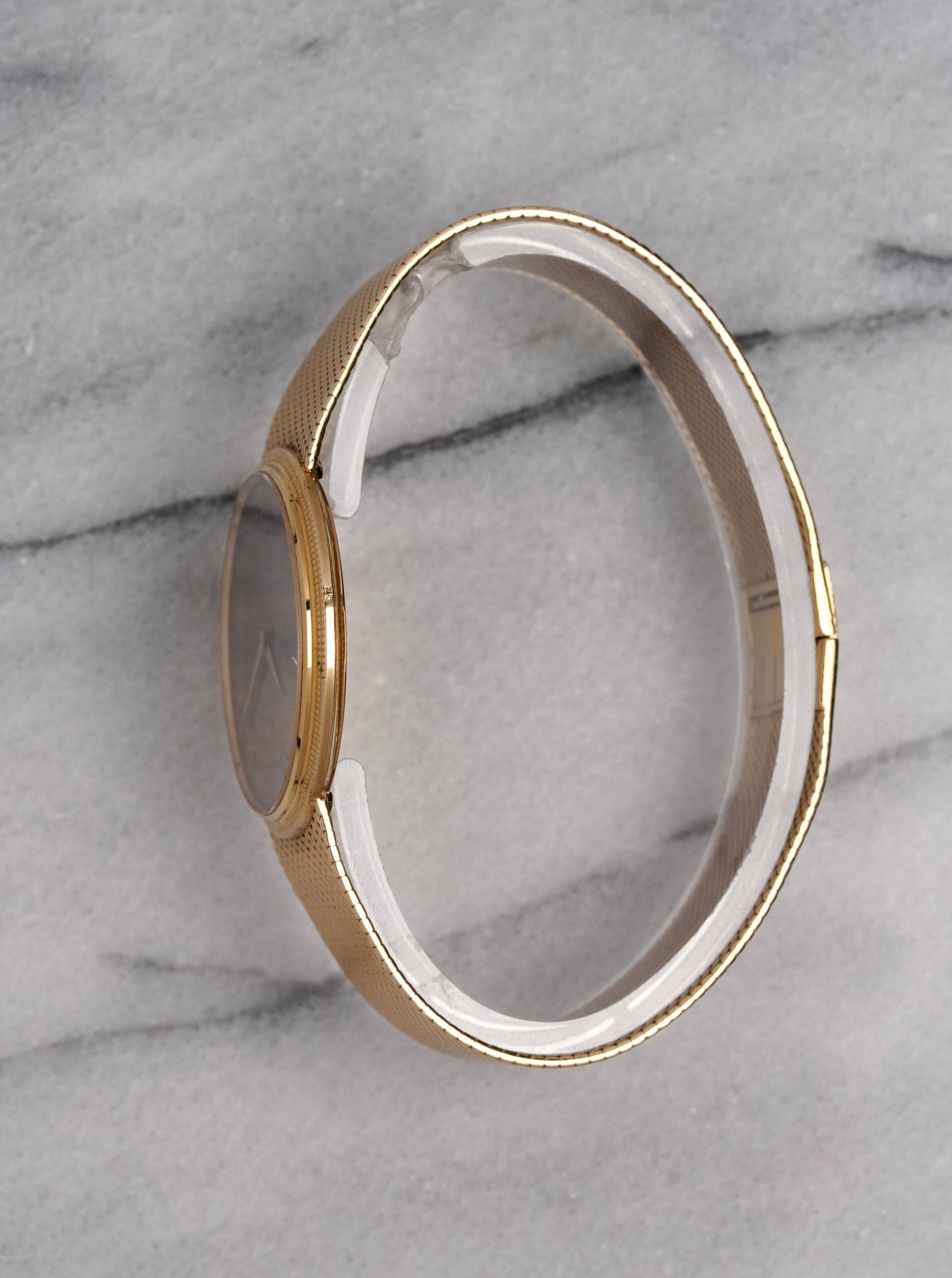 Piaget 18K Gold - Tiger Eye Dial.