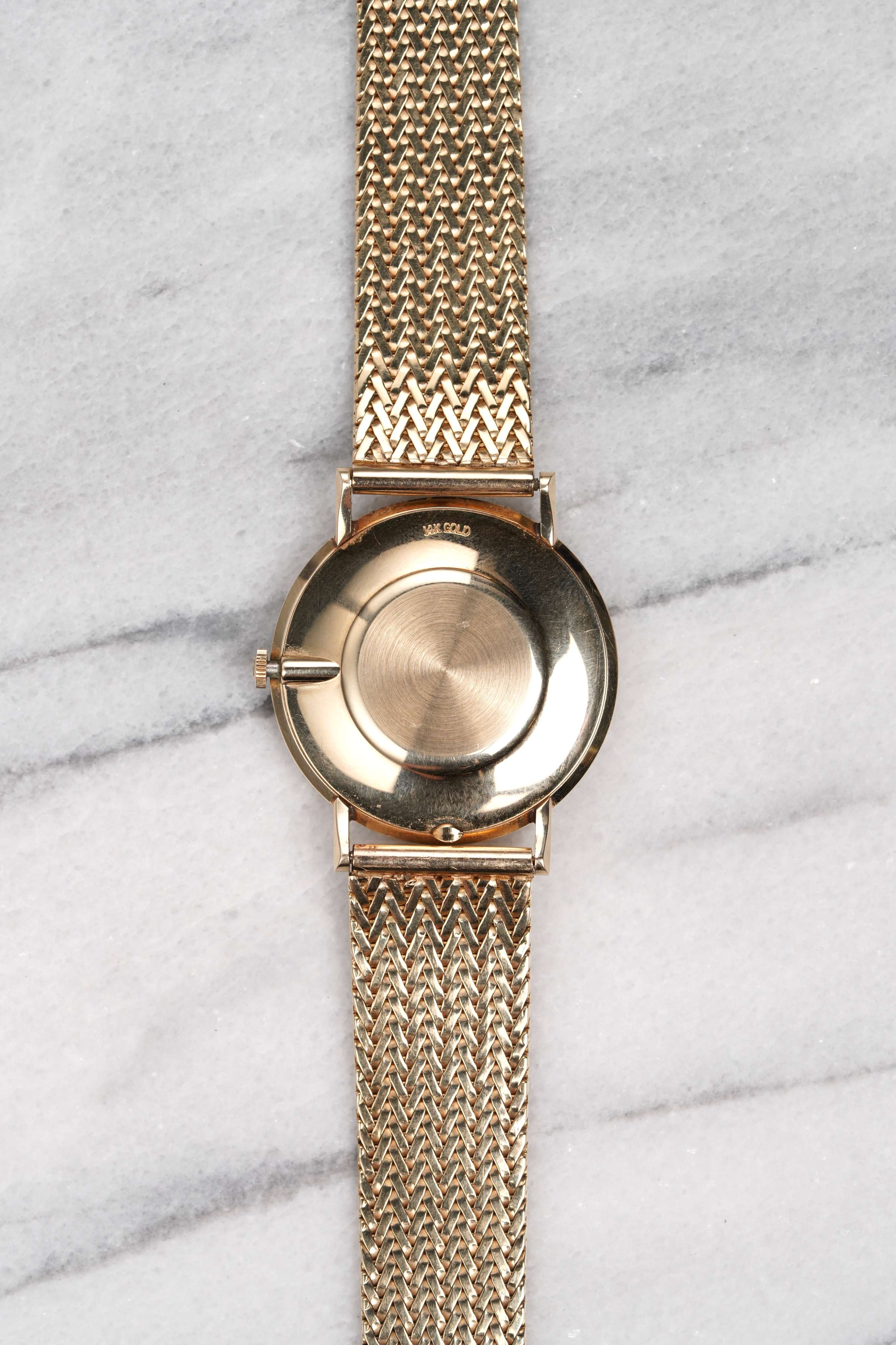 Omega - 14K Yellow Gold.