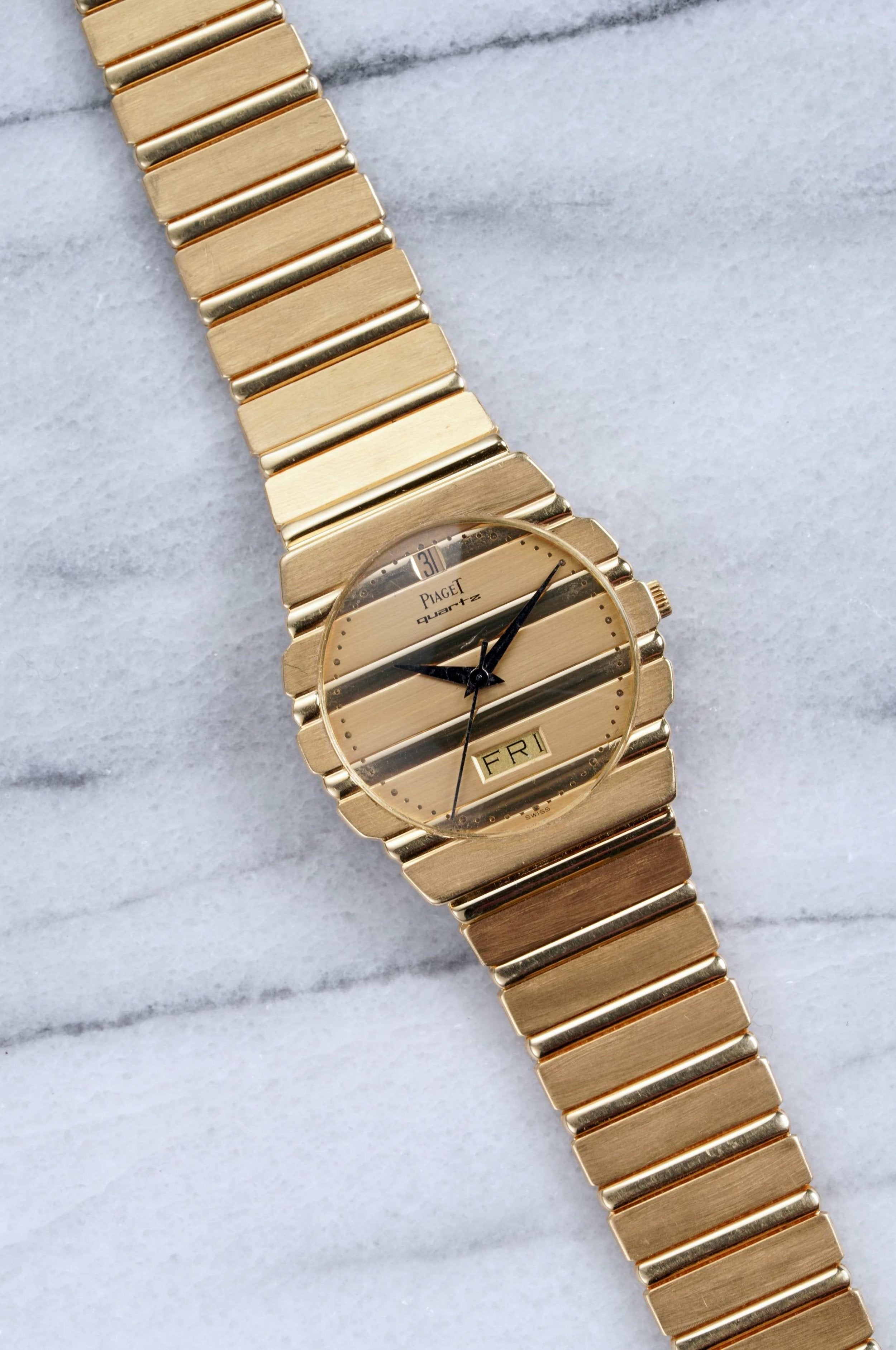 Piaget Polo - 18K Yellow Gold.