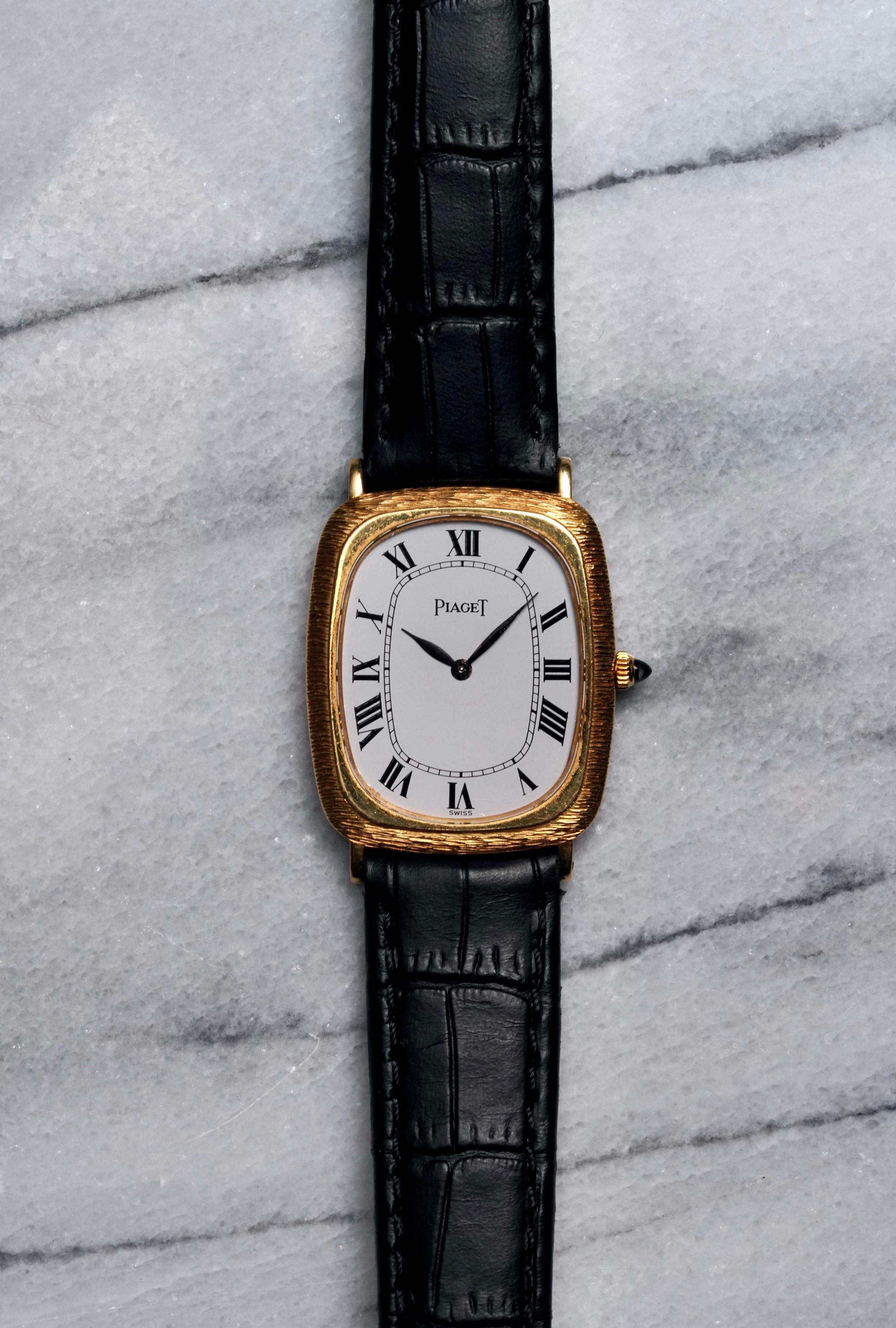 Piaget Tank - 18K Yellow Gold.