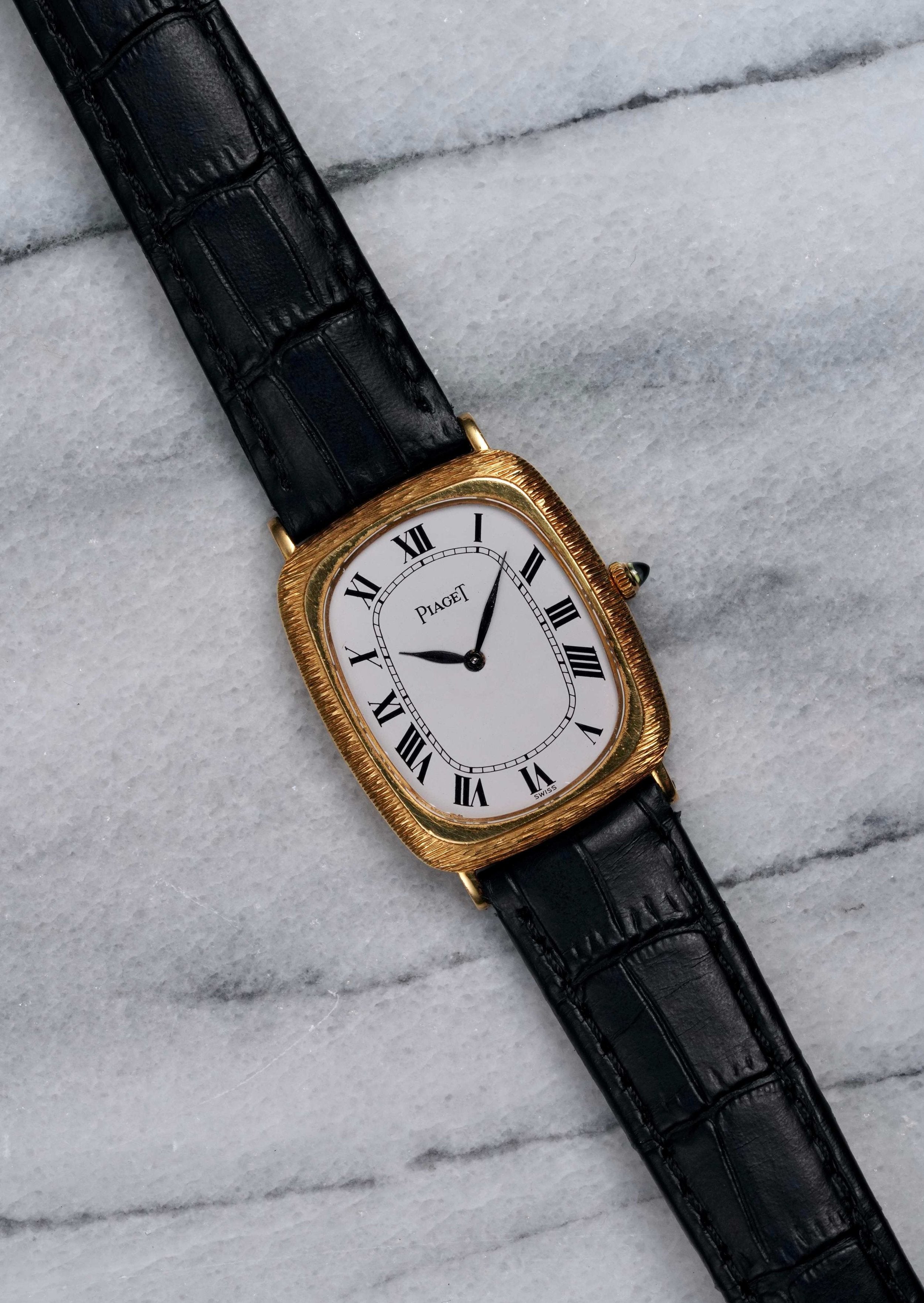 Piaget Tank - 18K Yellow Gold.