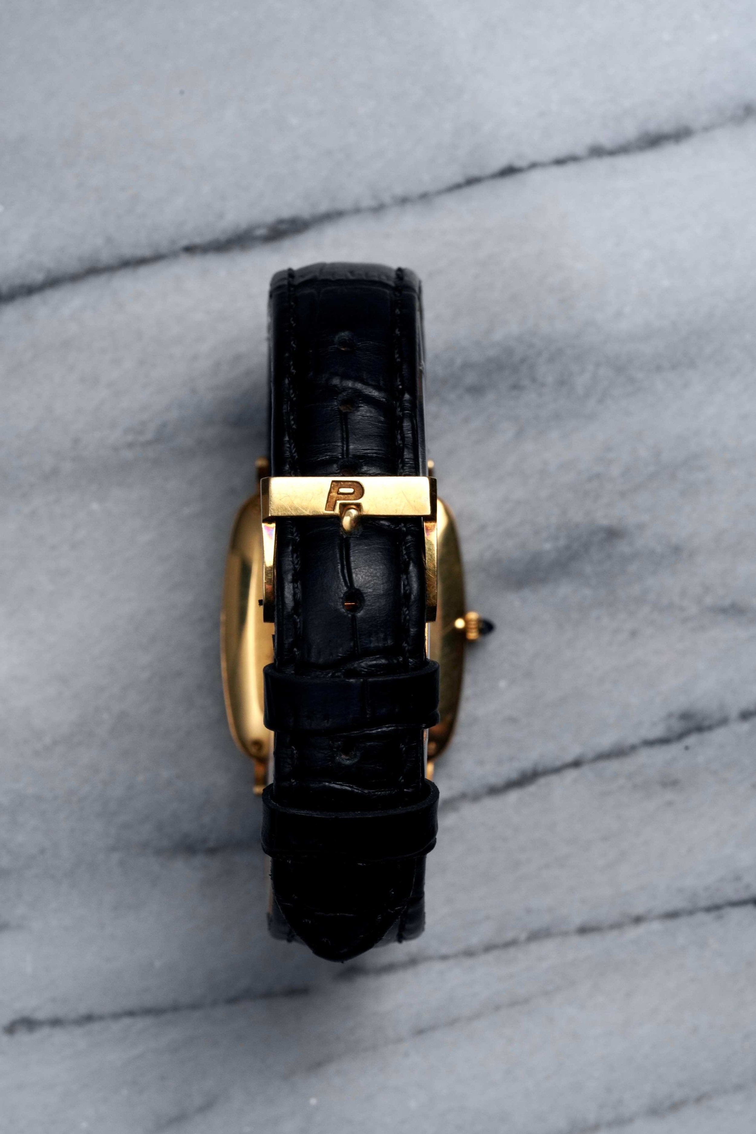 Piaget Tank - 18K Yellow Gold.