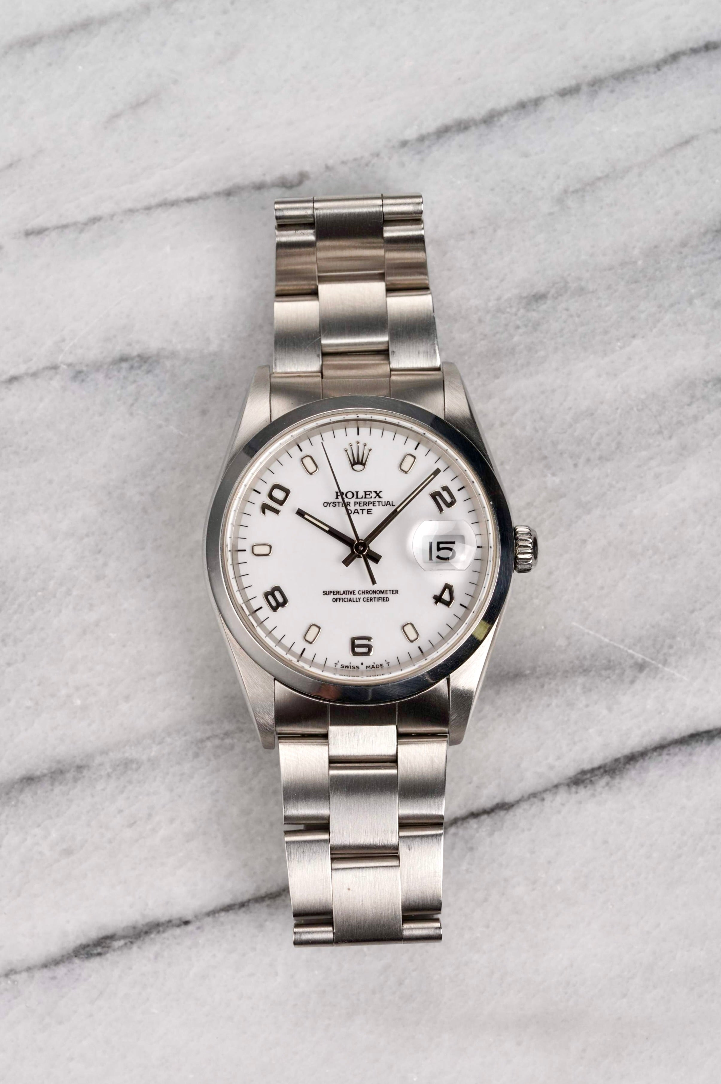 Rolex OP 15200 - White Arabic Dial.