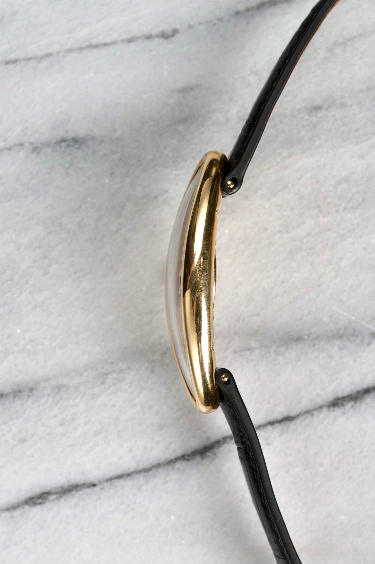 Cartier Baignoire - 18K Yellow Gold.