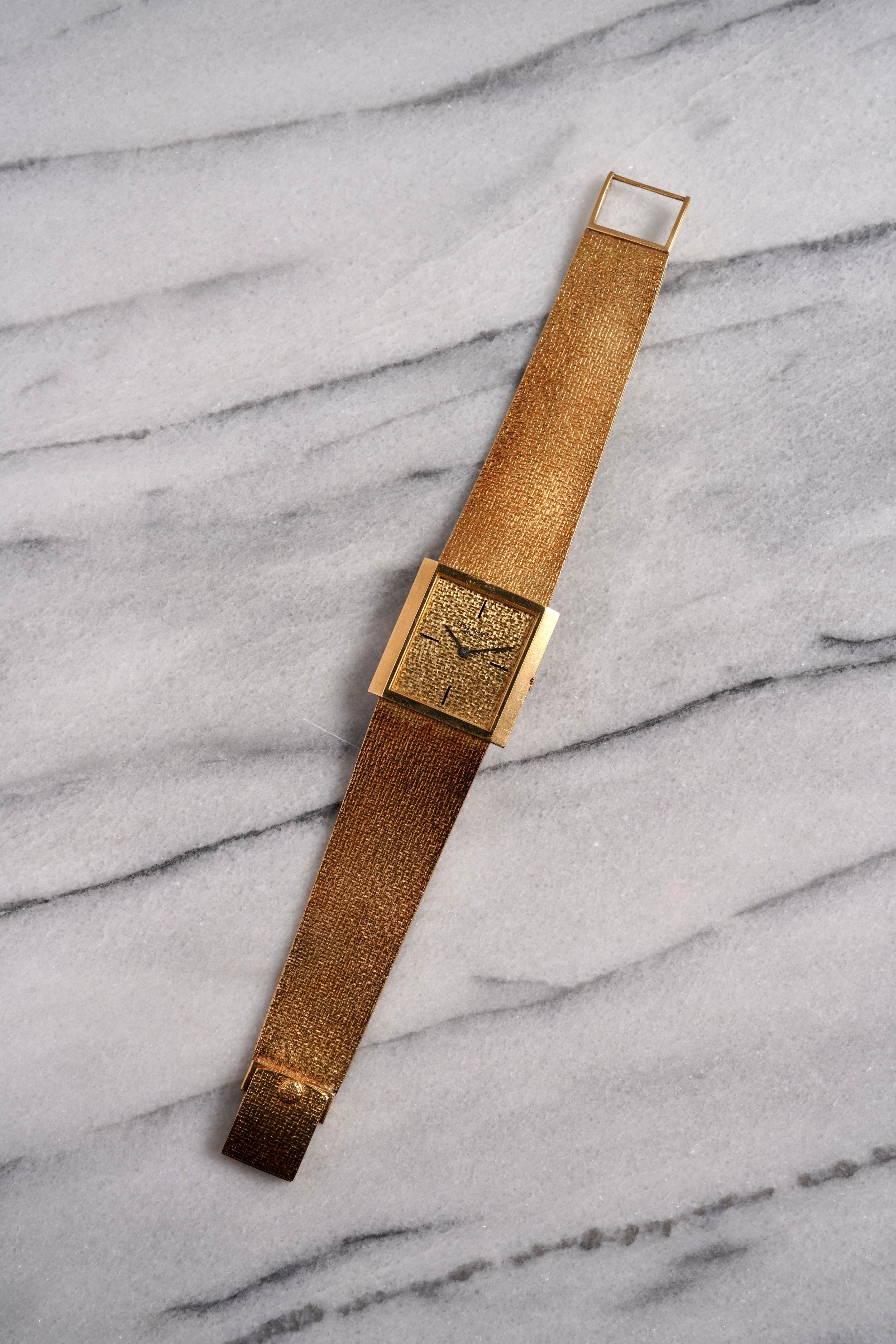 Patek Philippe - 18K Yellow Gold.