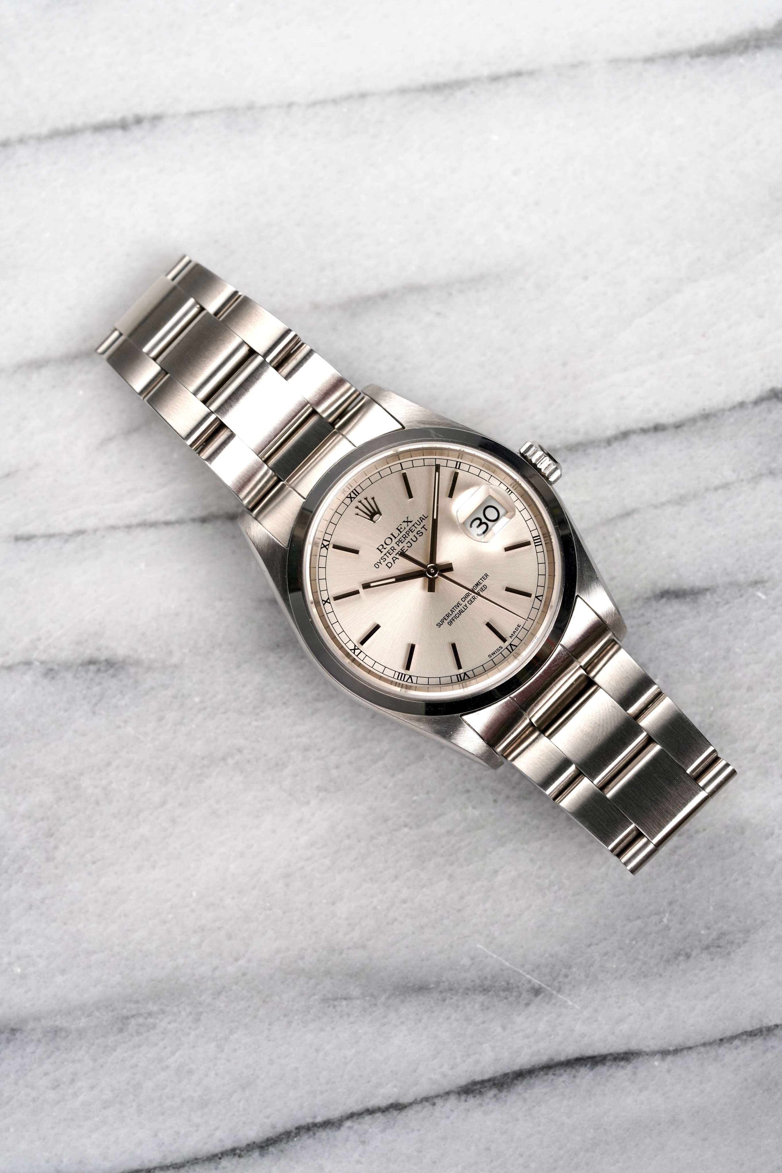 Rolex Datejust 16200 - Silver Dial w/ Papers.