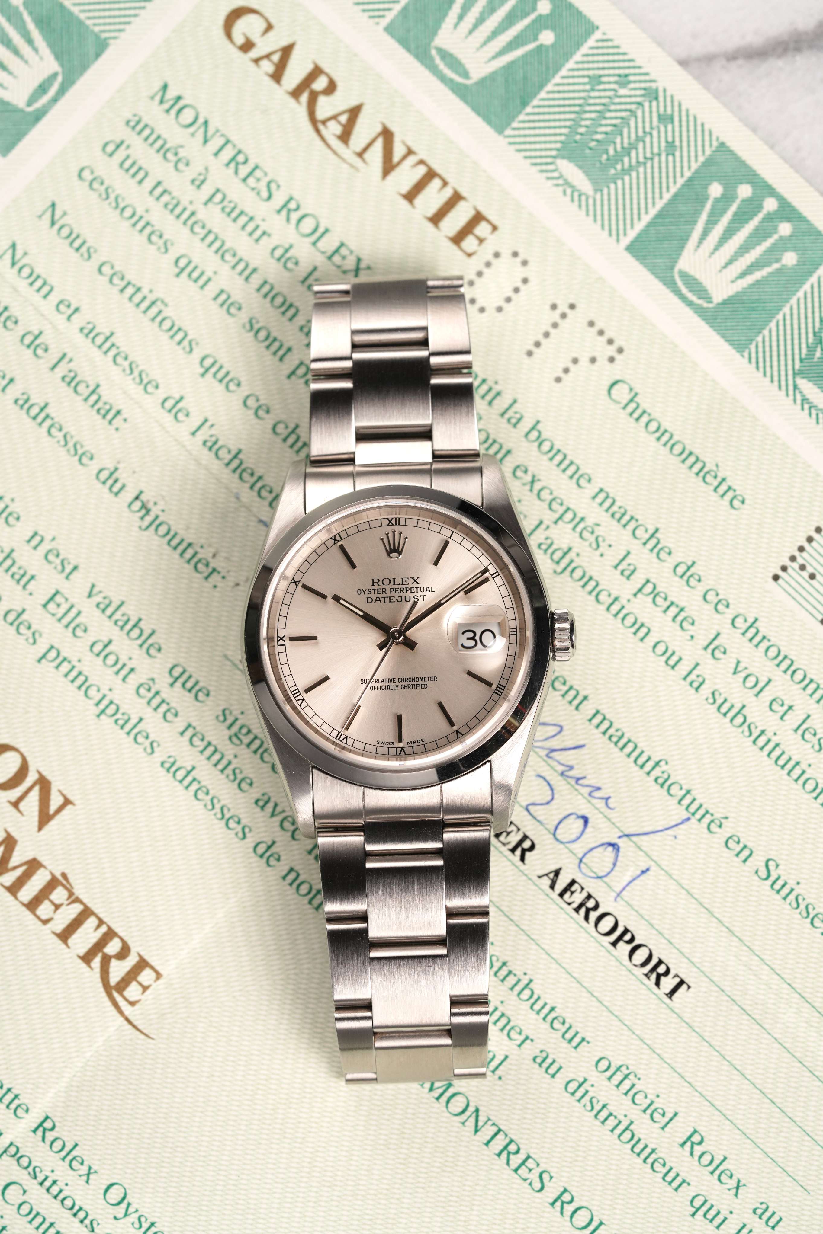 Rolex Datejust 16200 - Silver Dial w/ Papers.