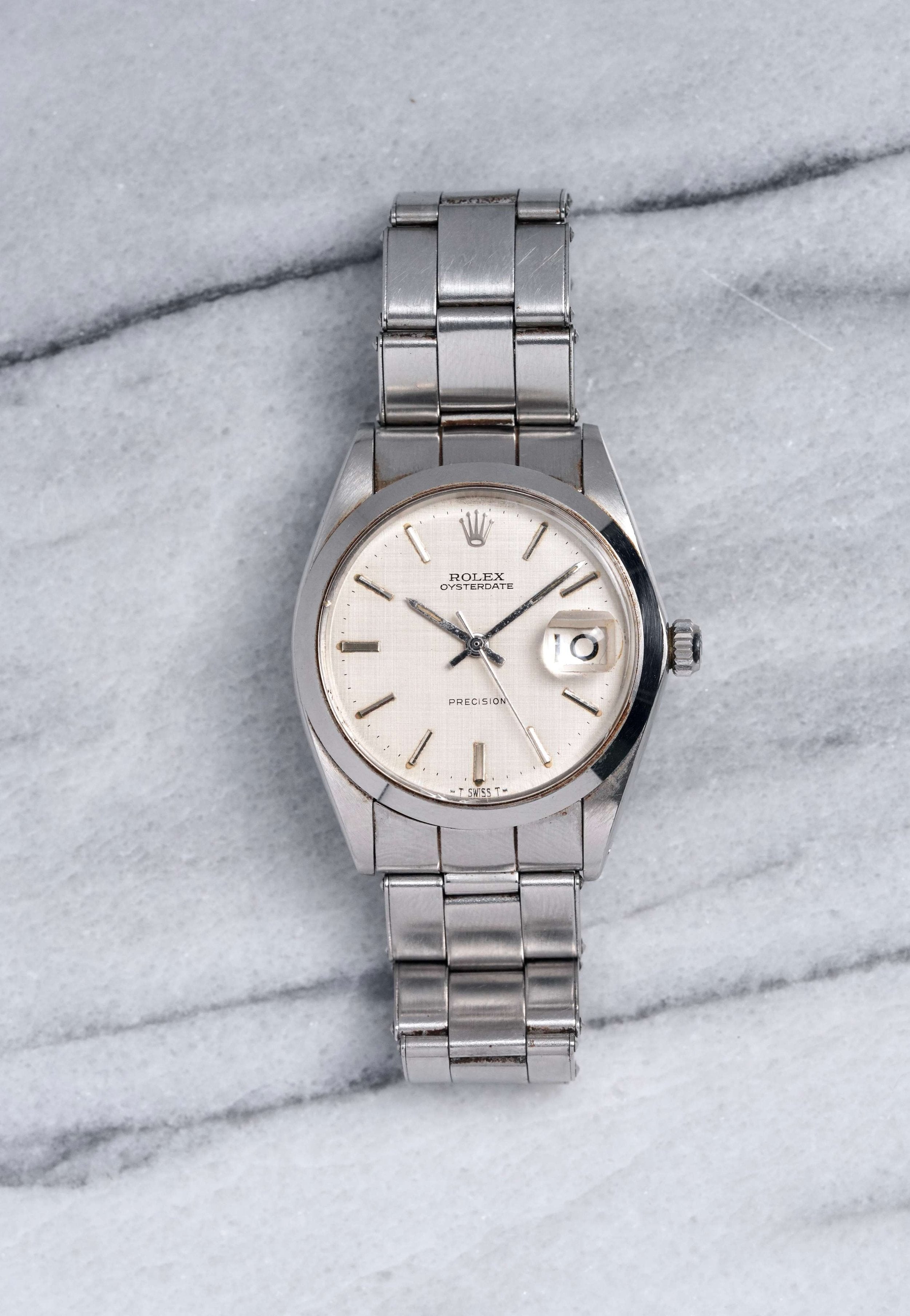 Rolex Oyster Date - Silver Linen Dial.