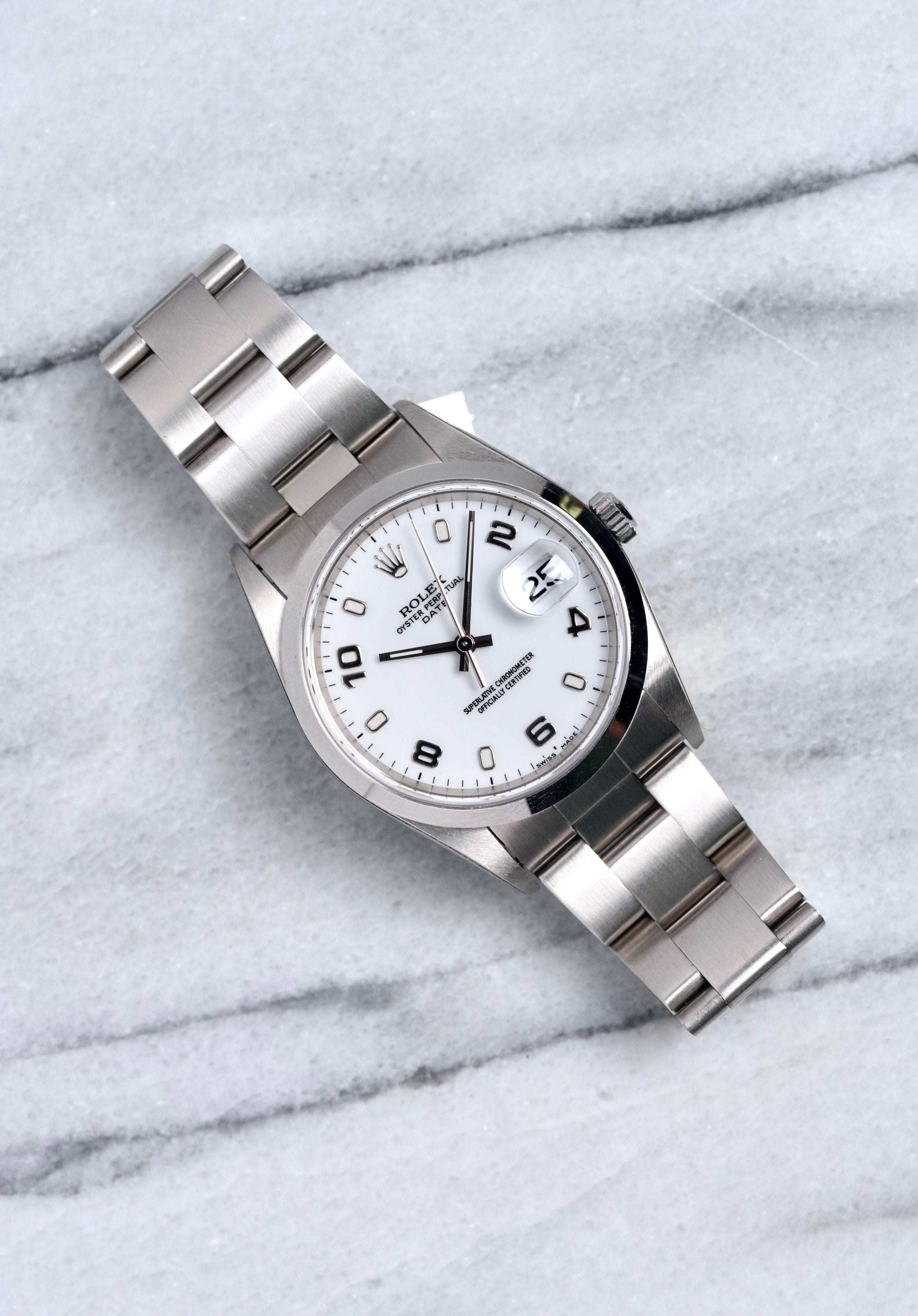 Rolex OP 15200 - White Dial w/ Papers.