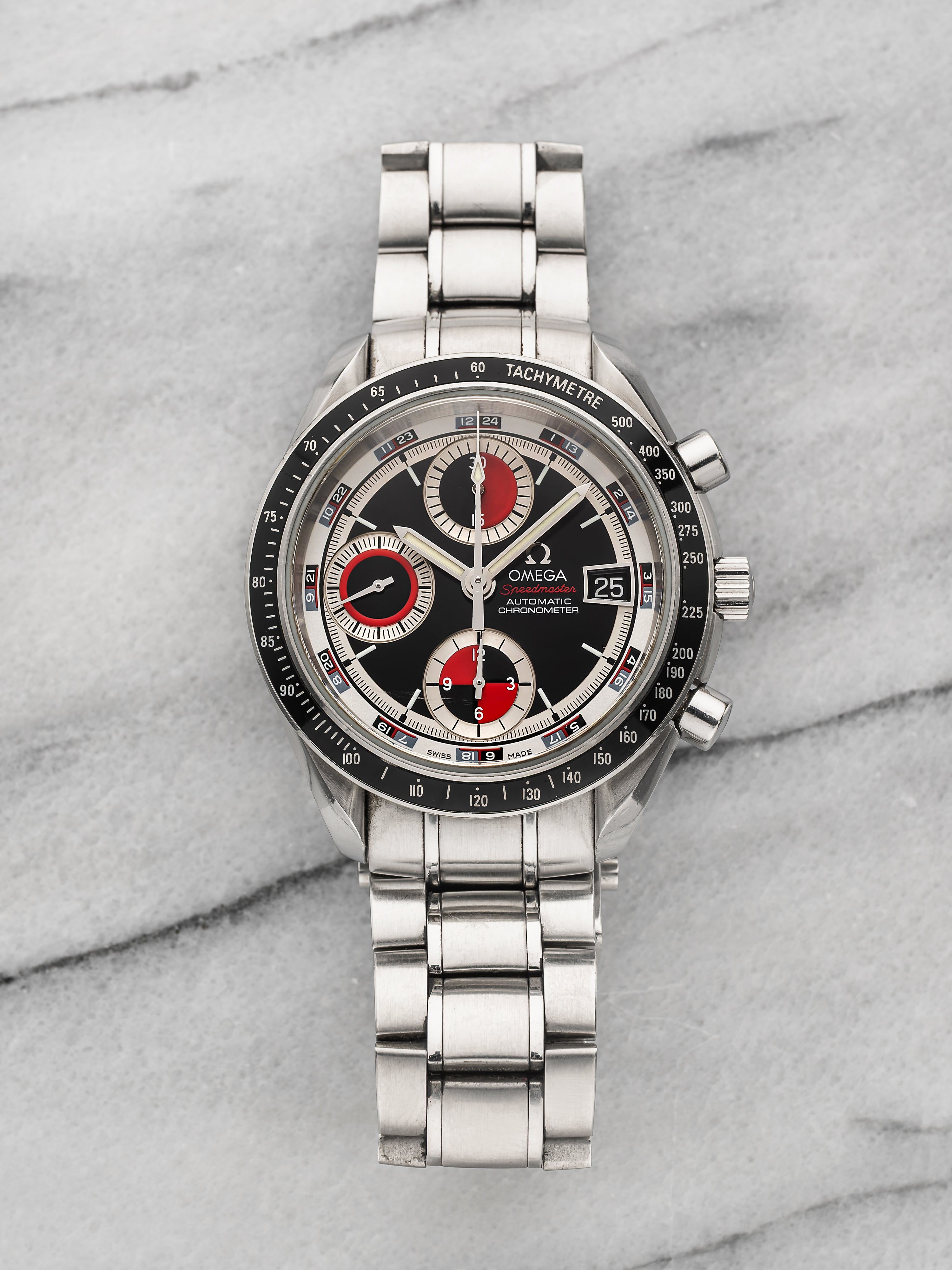 OMEGA Speedmaster DATE/DAY‑DATE 3210.52 Omega Speedmaster Date 3210.52.00 - Stainless Steel Black and Red Dial