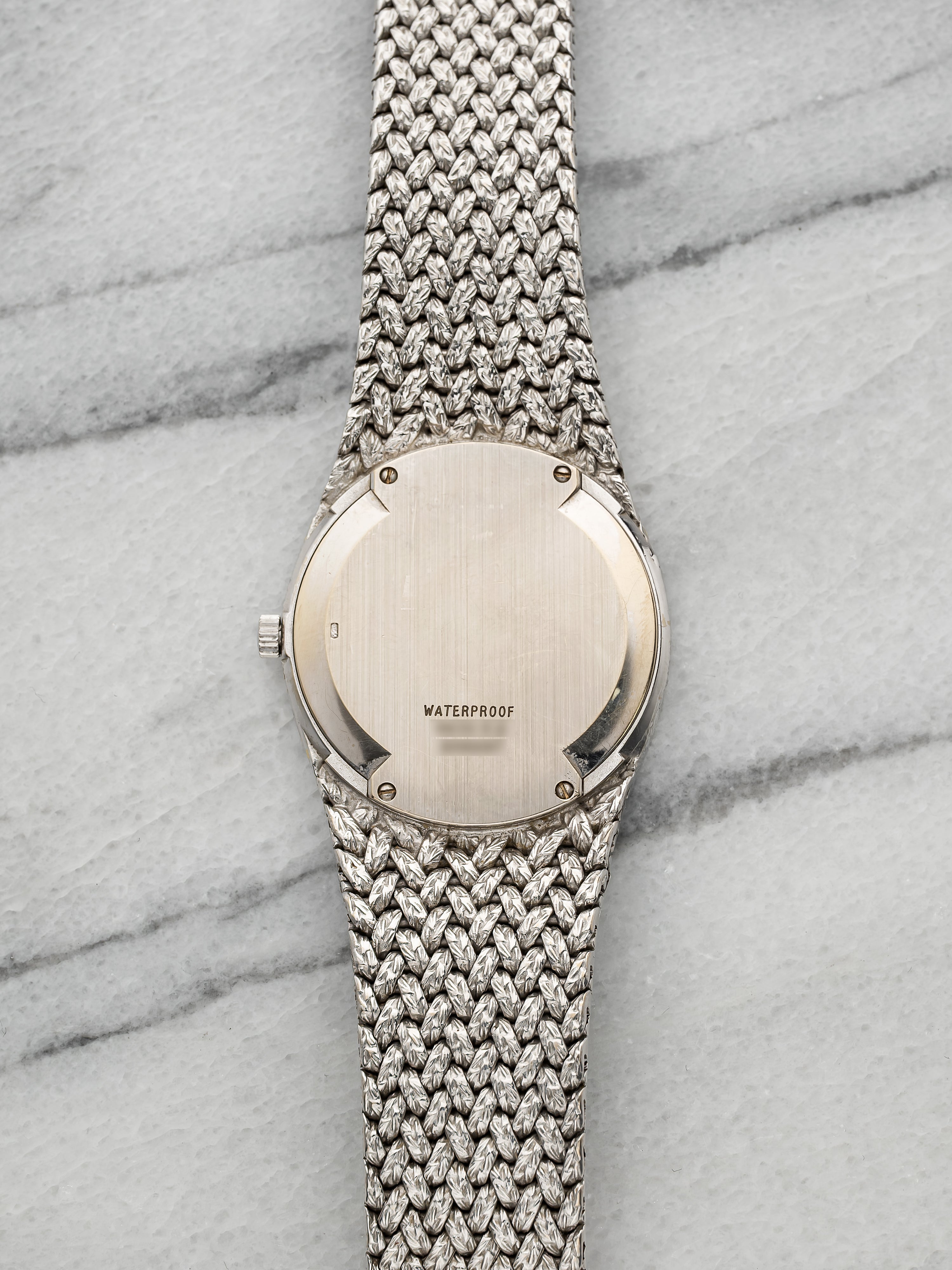 Piaget 9362D2 – White Gold Integrated Onyx & Pavé Dial