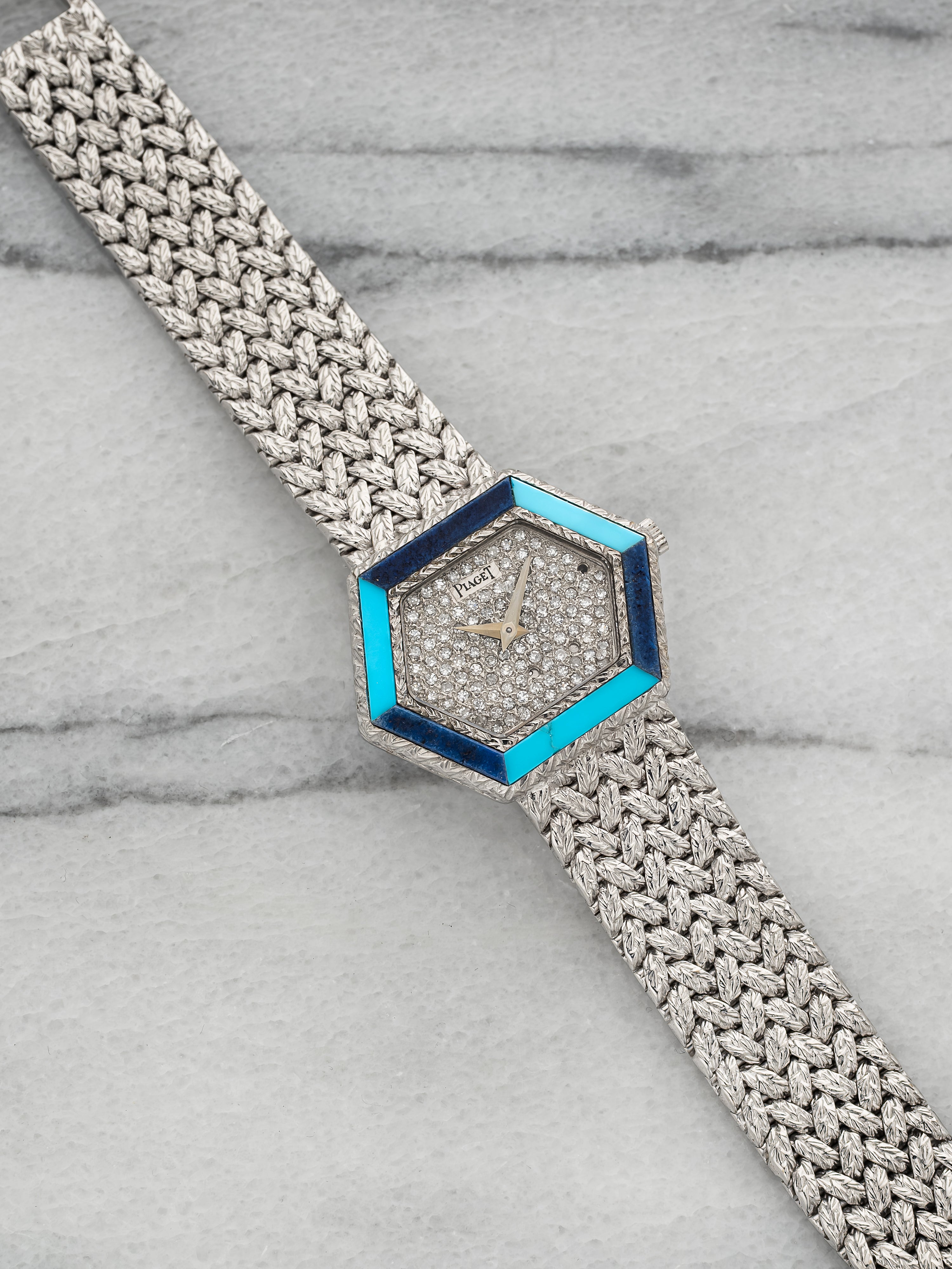 Piaget Hexagonal – White Gold Pavé Dial with Turquoise & Lapis Bezel