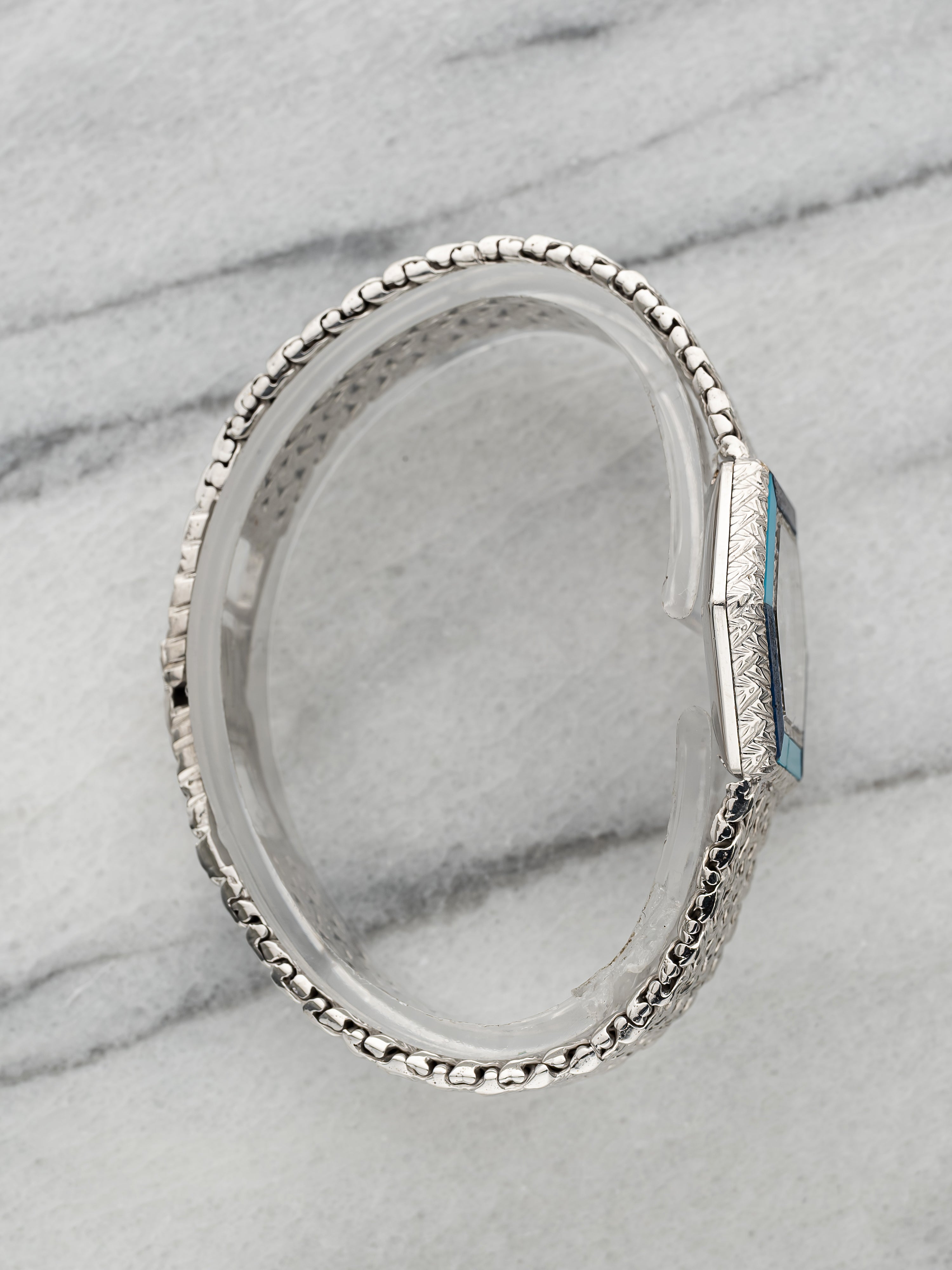 Piaget Hexagonal – White Gold Pavé Dial with Turquoise & Lapis Bezel