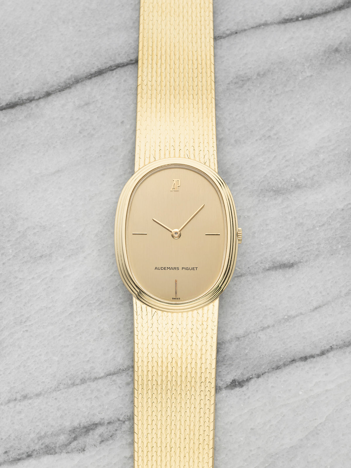 Vintage 1970s Audemars Piguet Ellipse 18K Yellow Gold Champagne Dial Manual 26mm
