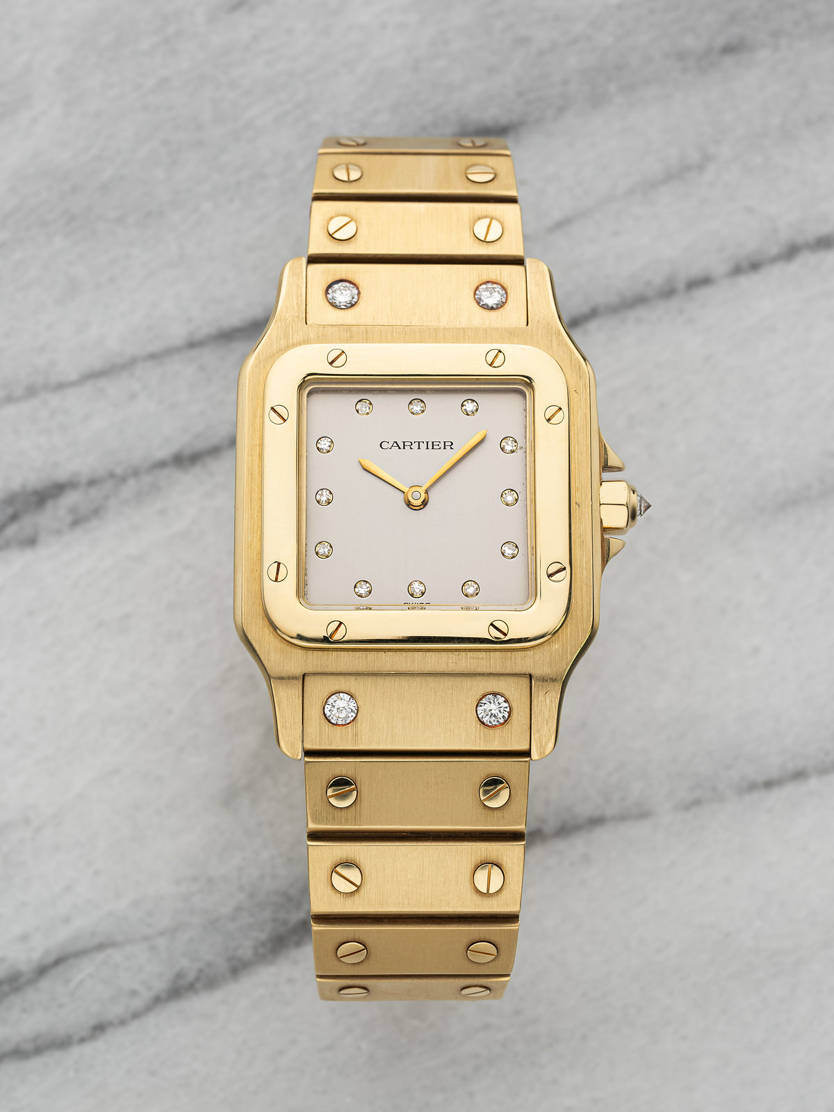 Yellow-gold Santos 2960 with the factory grey dial with diamond hour markers and diamonds in the bracelet in place of screws. · Photo: Danny's Vintage Watches · © Danny's Vintage Watches, used with permission · Source: https://dannysvintagewatches.com/products/cartier-santos-2960-yellow-gold-grey-diamond-dial