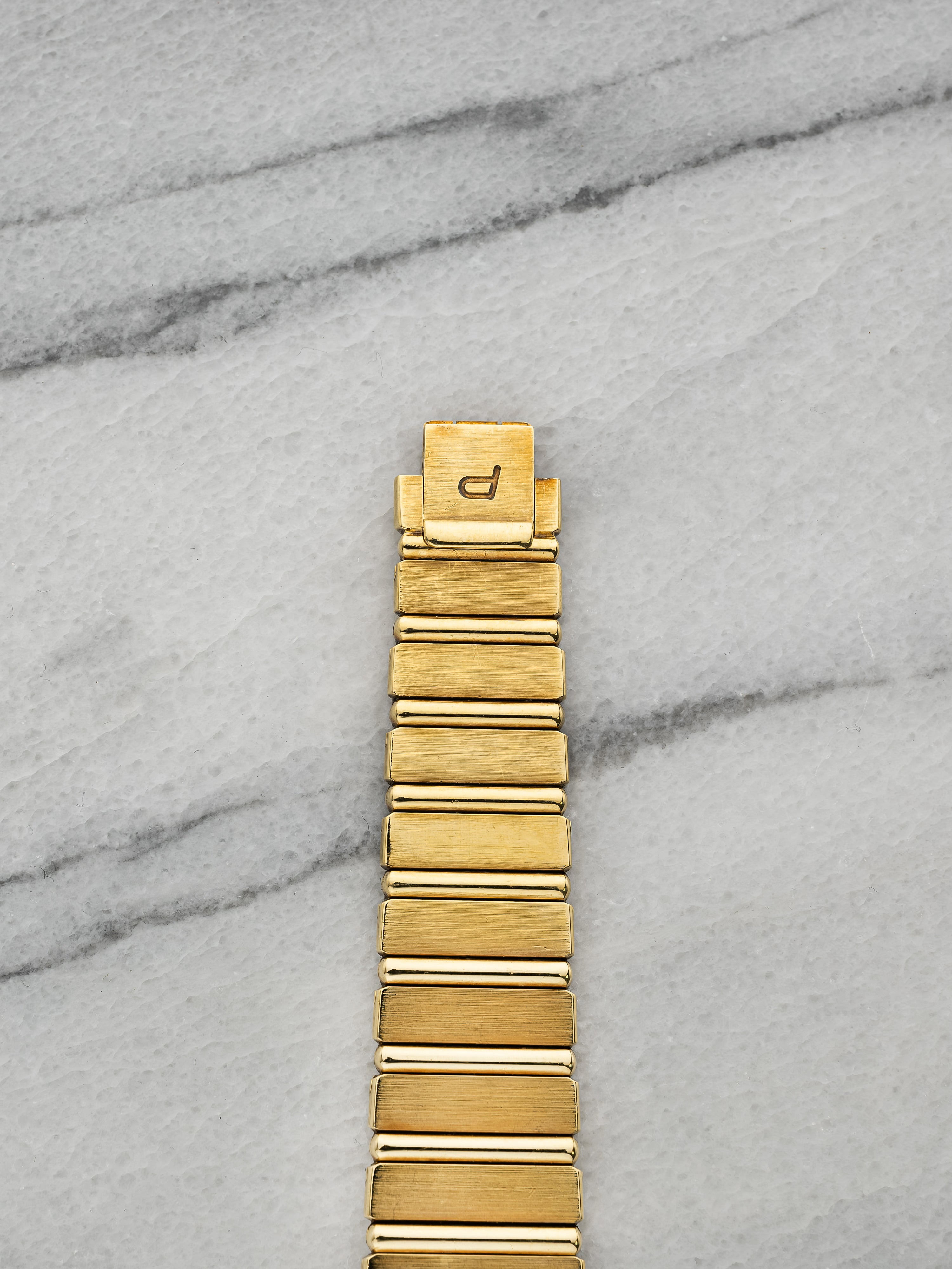 Piaget Polo – 18K Yellow Gold Champagne Dial