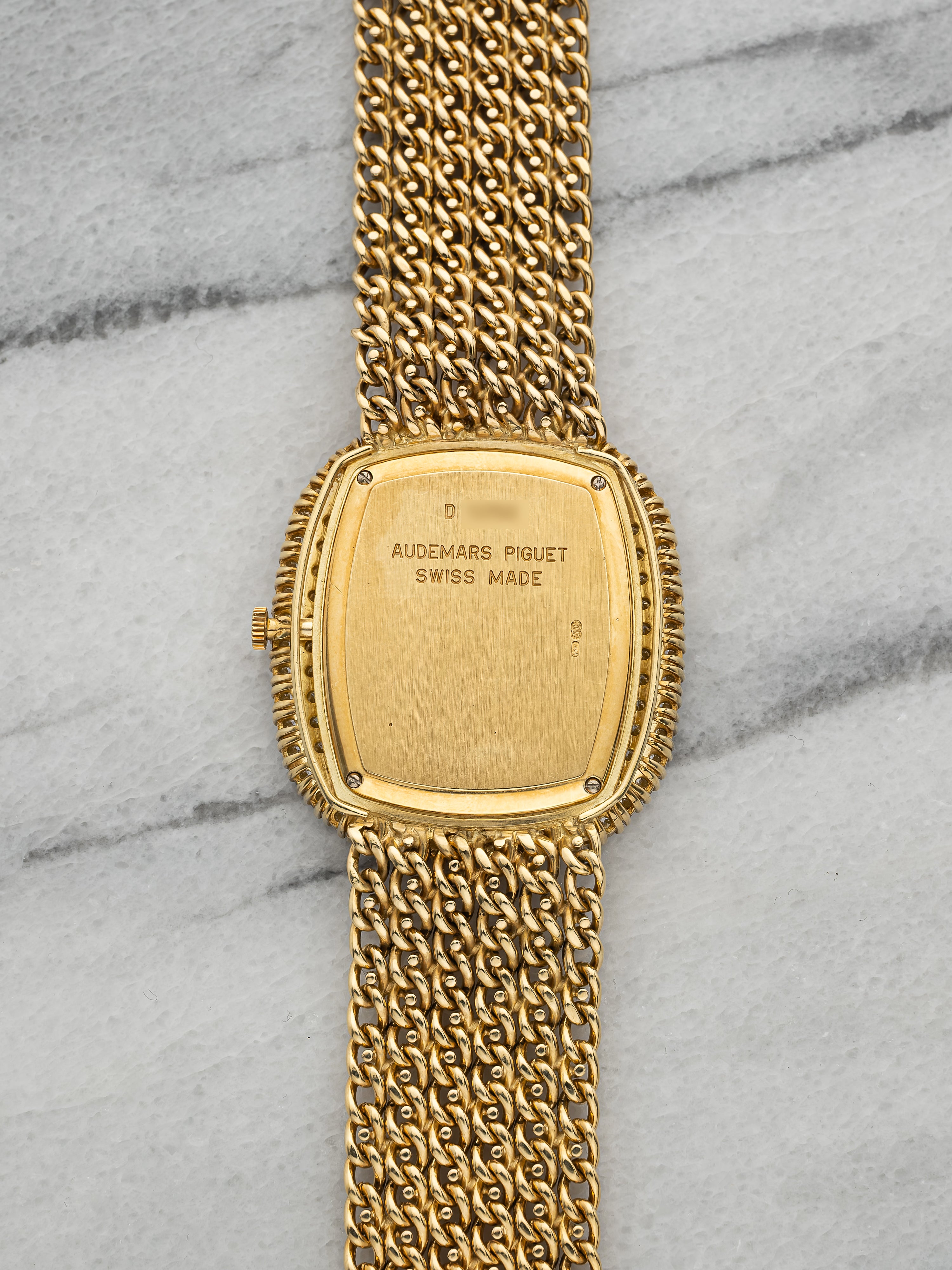 Audemars Piguet Haute Joaillerie 14720BA – Yellow Gold Pavé Ruby Dial