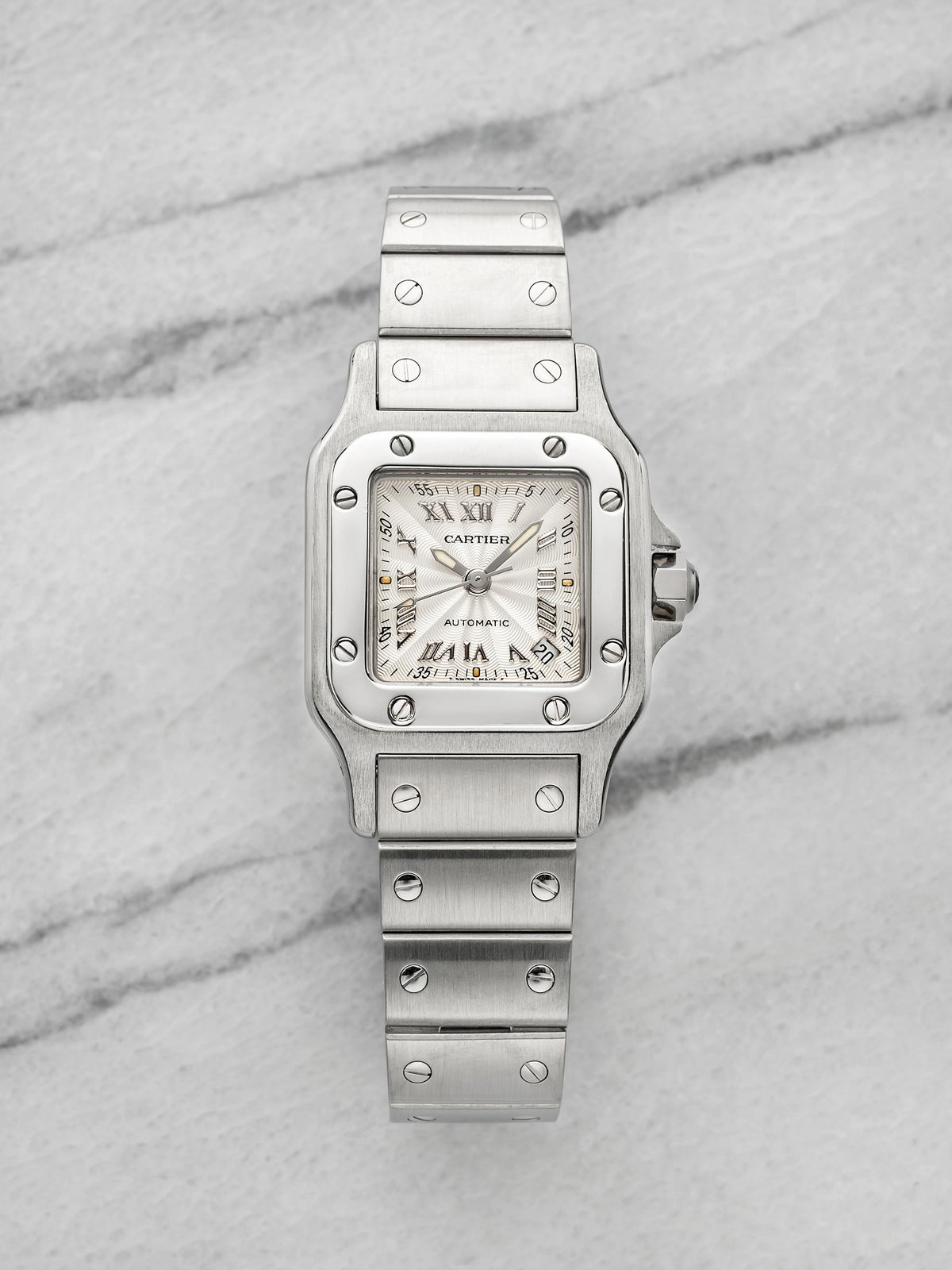Photo of the documented piece at Danny's Vintage Watches · Photo: Danny's Vintage Watches · © Danny's Vintage Watches, used with permission · Source: https://dannysvintagewatches.com/products/cartier-ladies-santos-galbee-2423-automatic-stainless-steel-silver-guilloche-dial