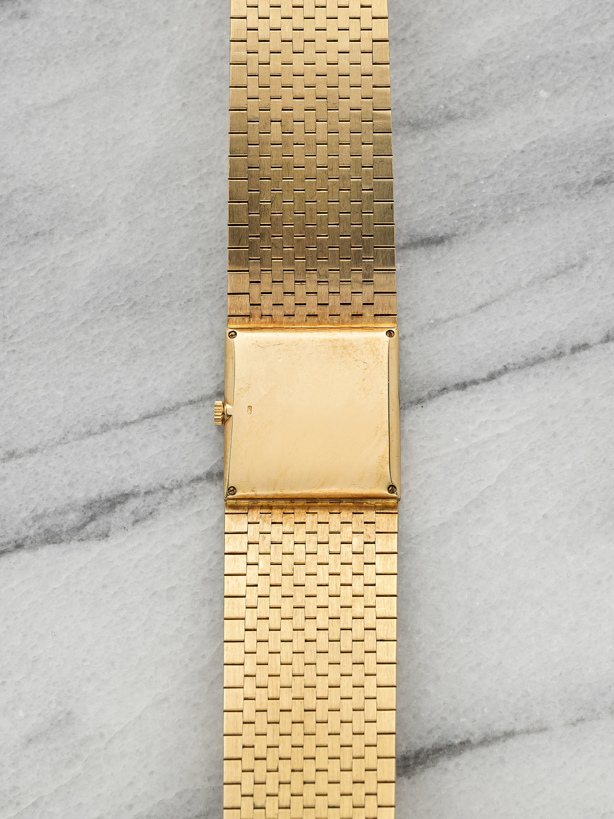 Vintage 1980s Piaget Ultra Thin Integrated 18K YG Champagne Dial Manual 23mm