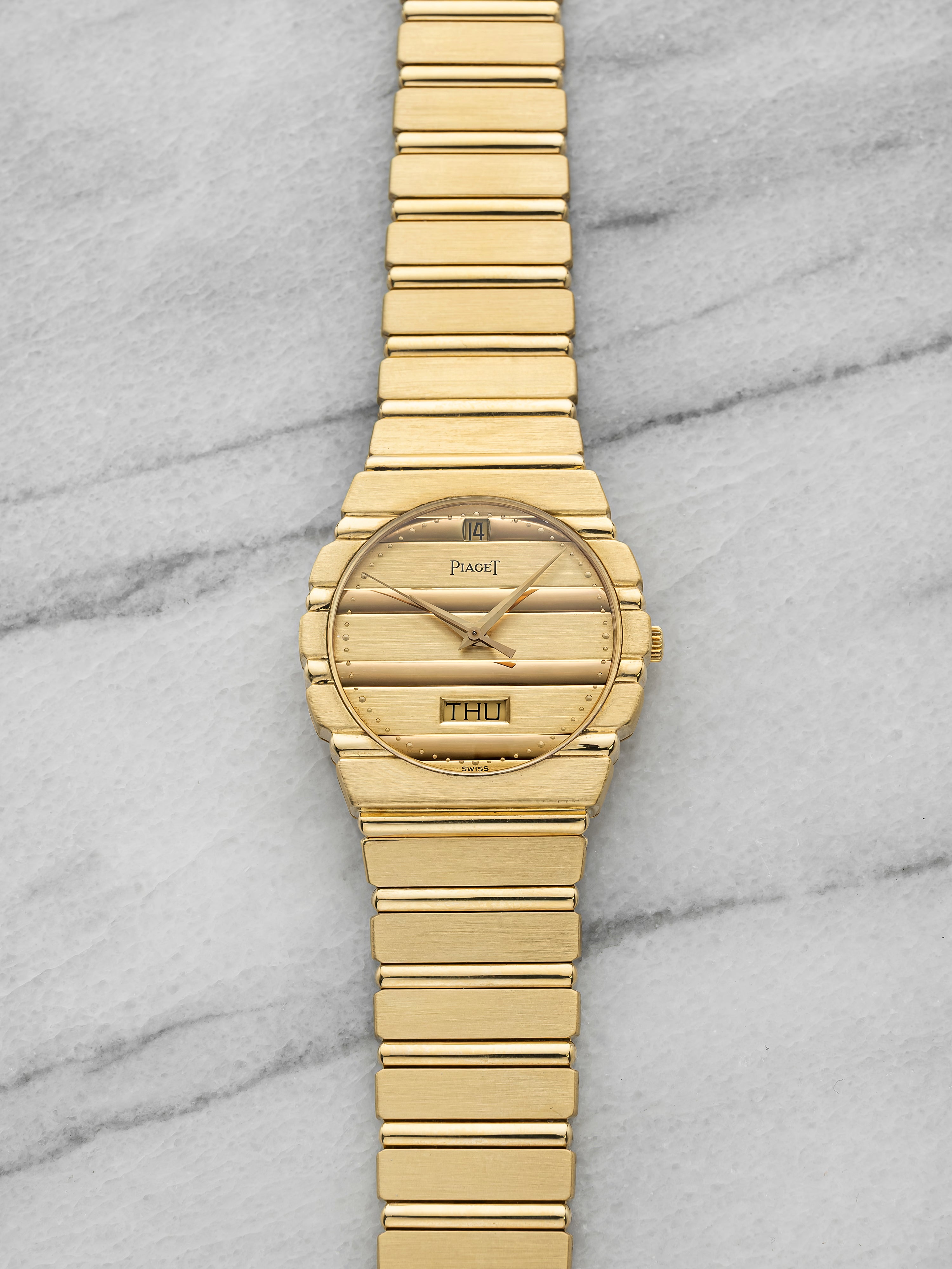 Vintage 1980s Piaget Polo 15562 C701 18K Yellow Gold Champagne Dial Quartz 31mm