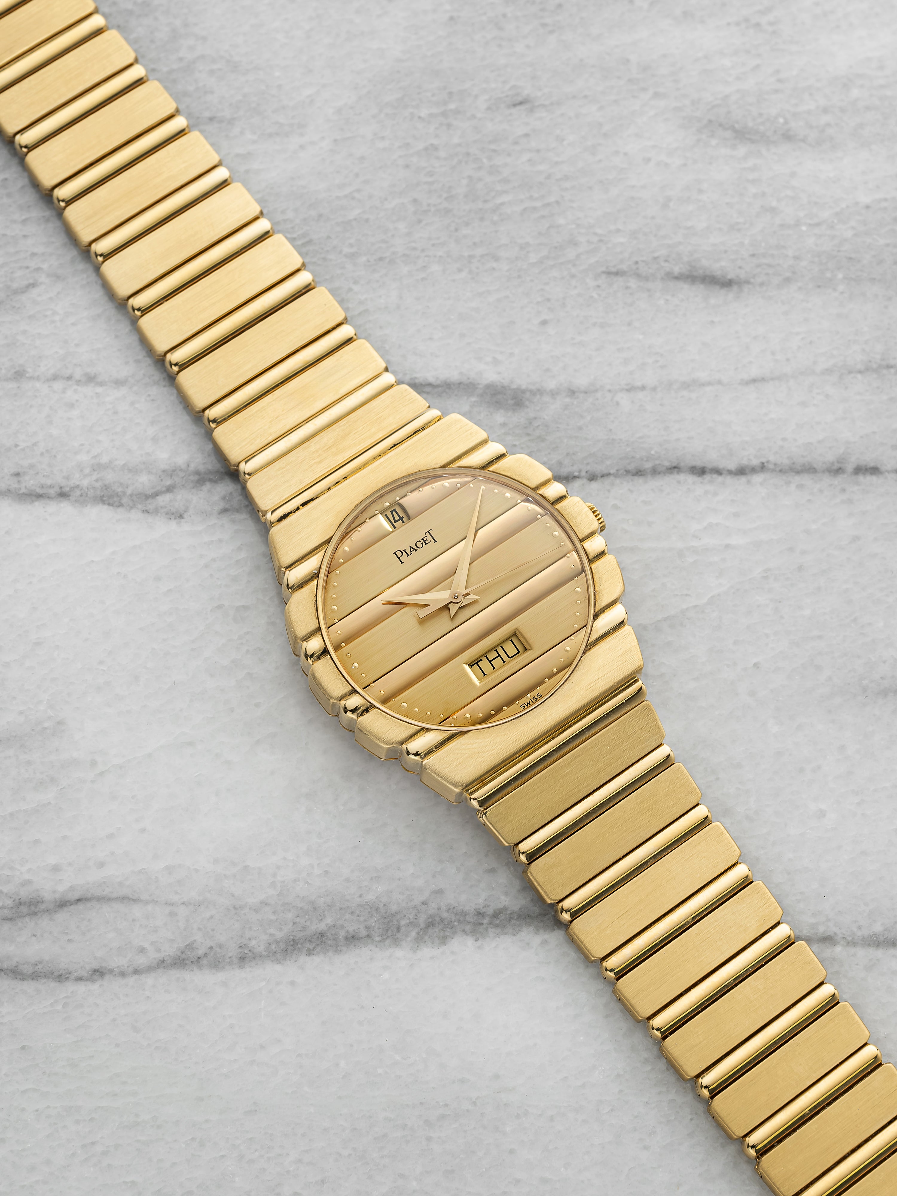 Vintage 1980s Piaget Polo 15562 C701 18K Yellow Gold Champagne Dial Quartz 31mm