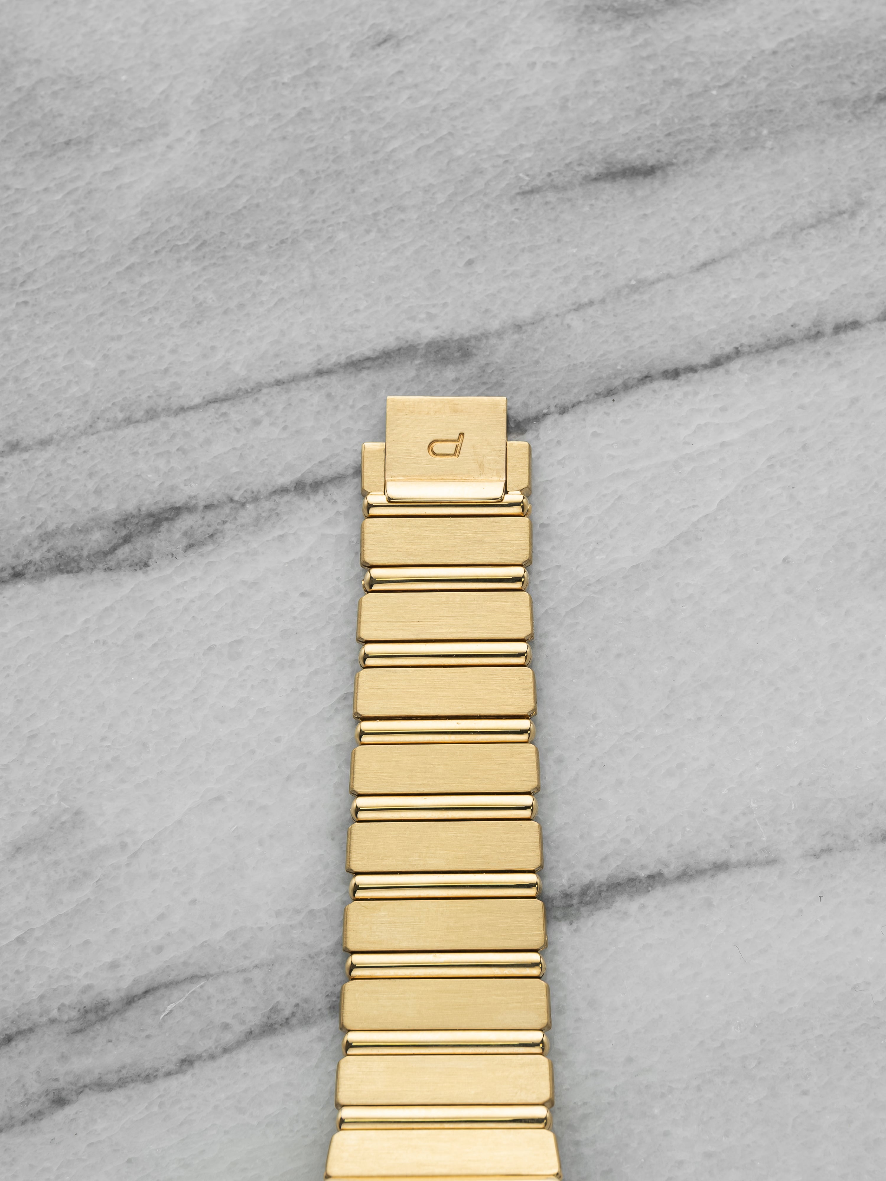 Vintage 1980s Piaget Polo 15562 C701 18K Yellow Gold Champagne Dial Quartz 31mm