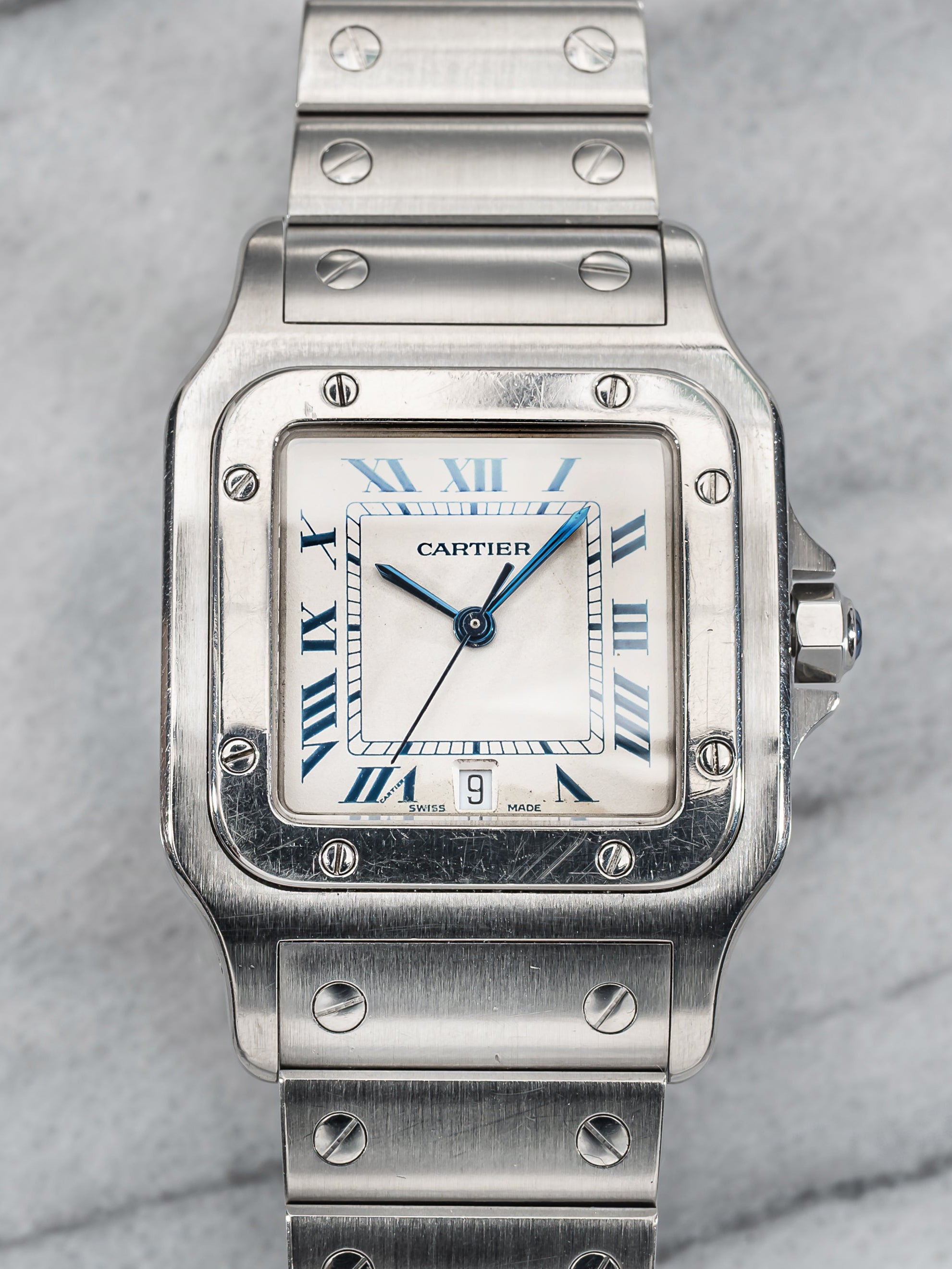 Cartier Santos 1564 – White & Blue Roman Dial.