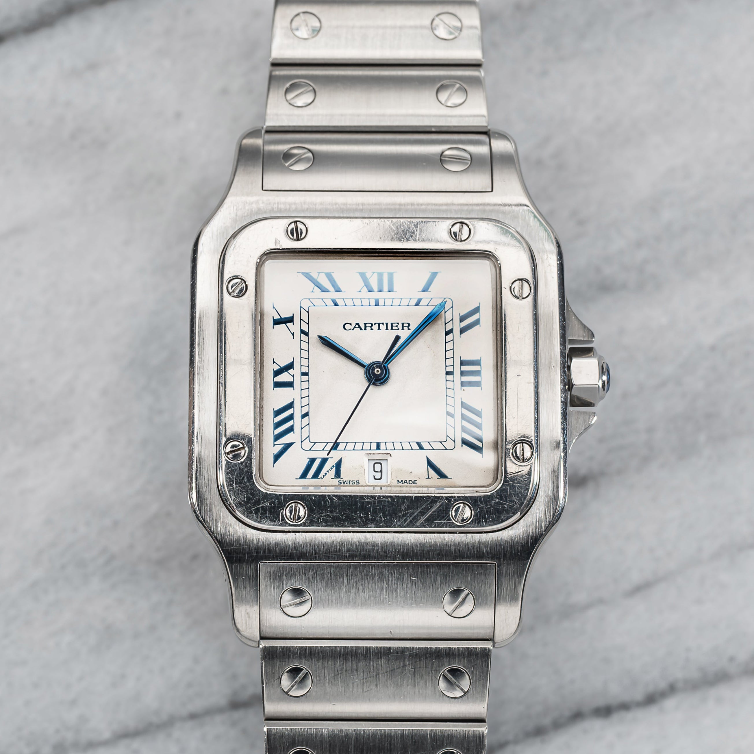 Cartier Santos 1564 – White & Blue Roman Dial.