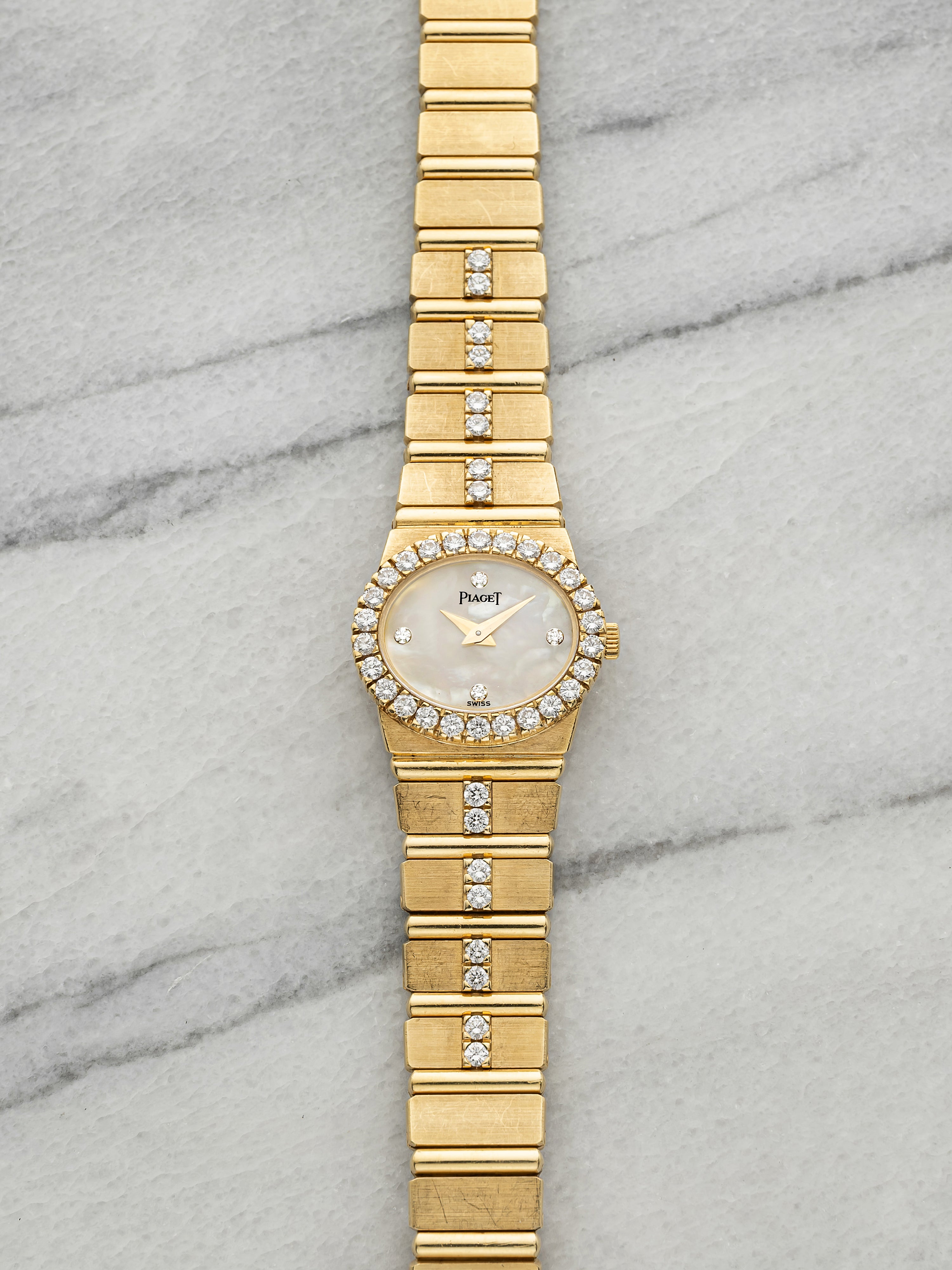 Vintage 1970s Piaget Lady Polo 8306 C702 18K YG MoP Diamond Dial Quartz 22mm