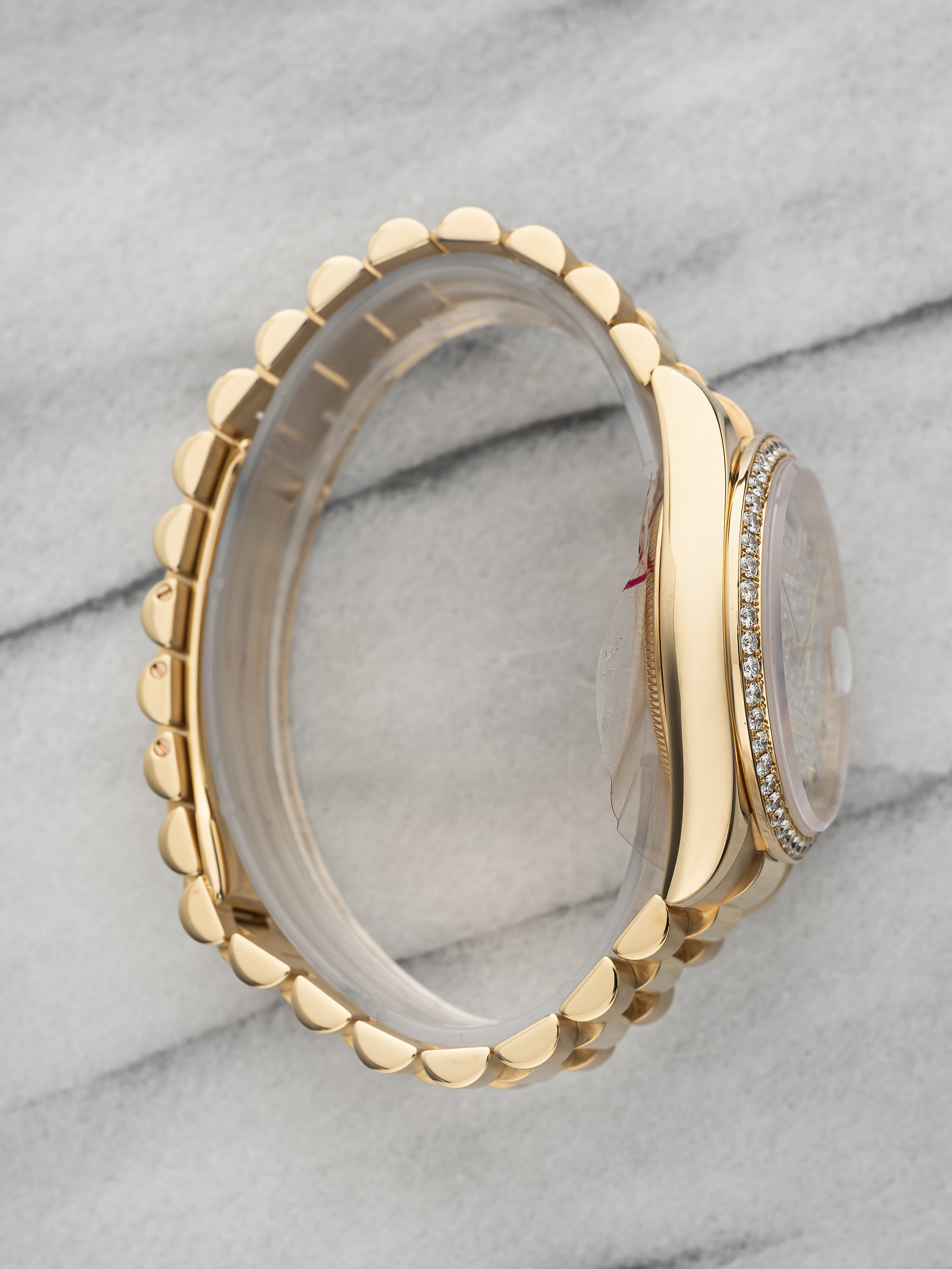 2009 Rolex Day-Date 118348 - Diamond Bezel Pave Ruby Dial