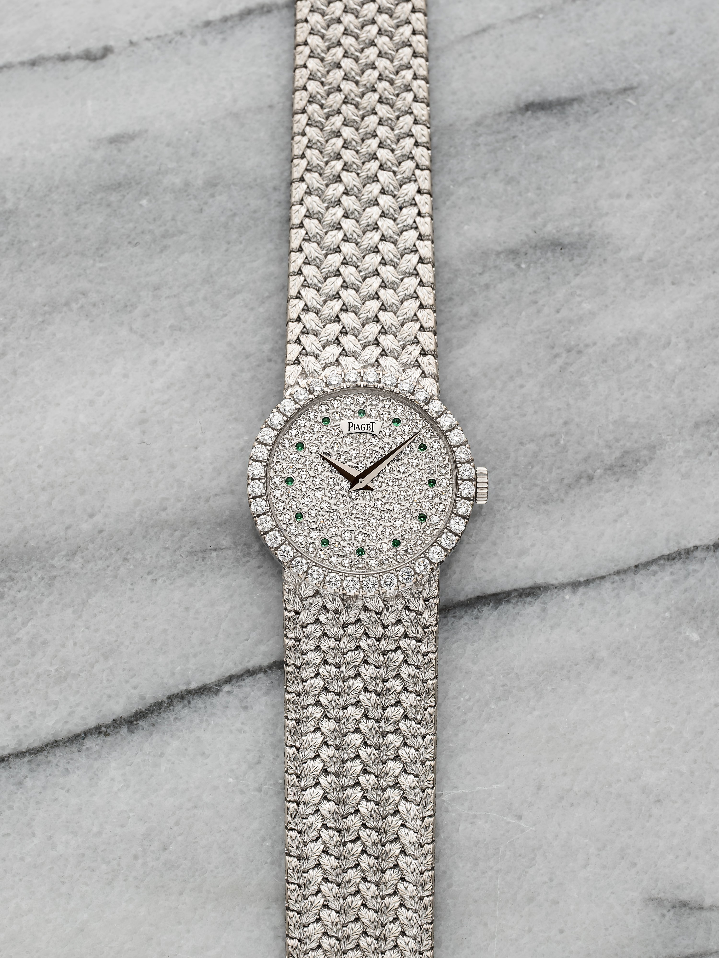 Piaget 9706 - Integrated White Gold Pave Emerald Dial