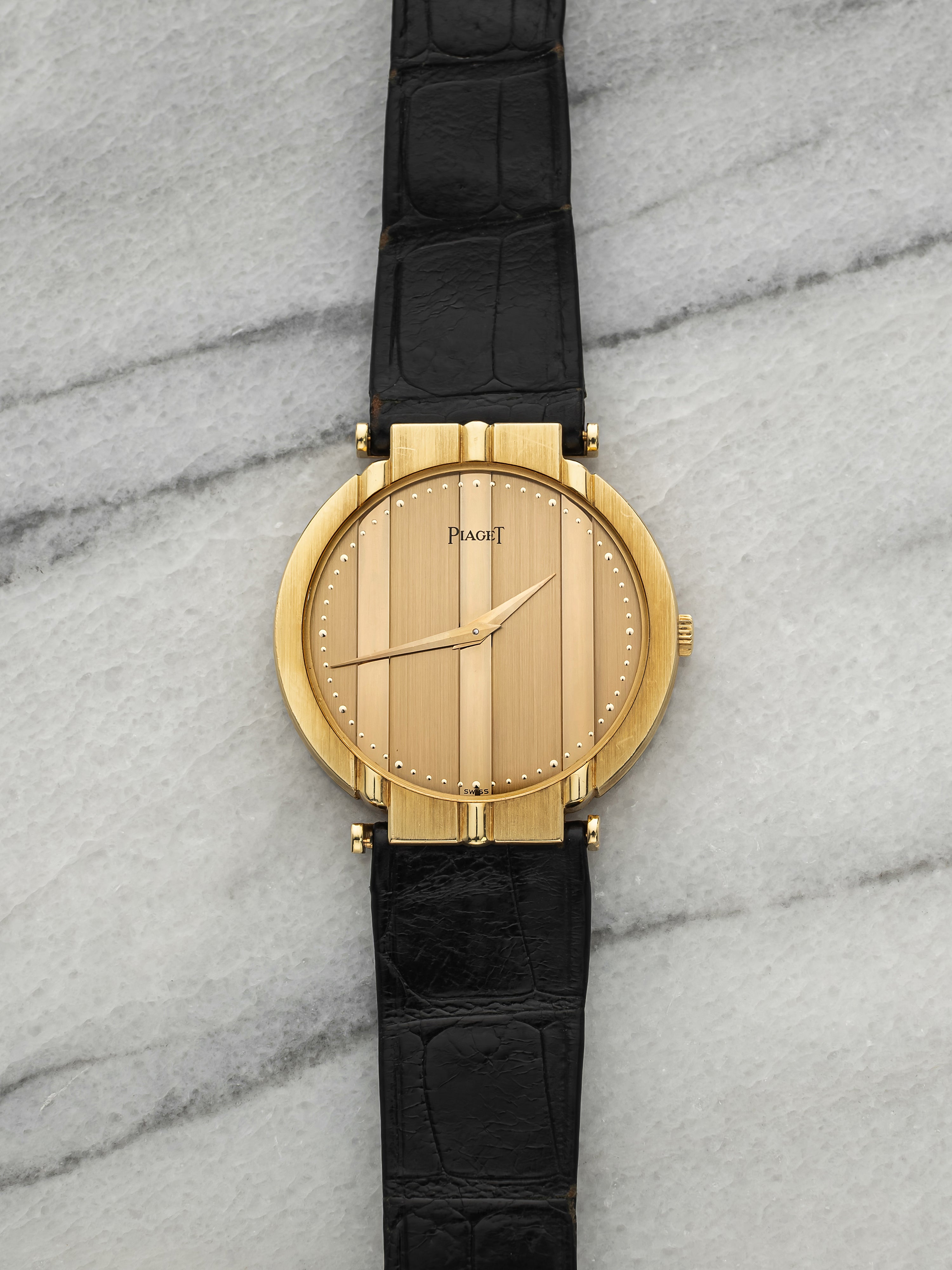 Vintage 1980s Piaget Polo 8673 18K Yellow Gold Champagne Dial Quartz 31mm