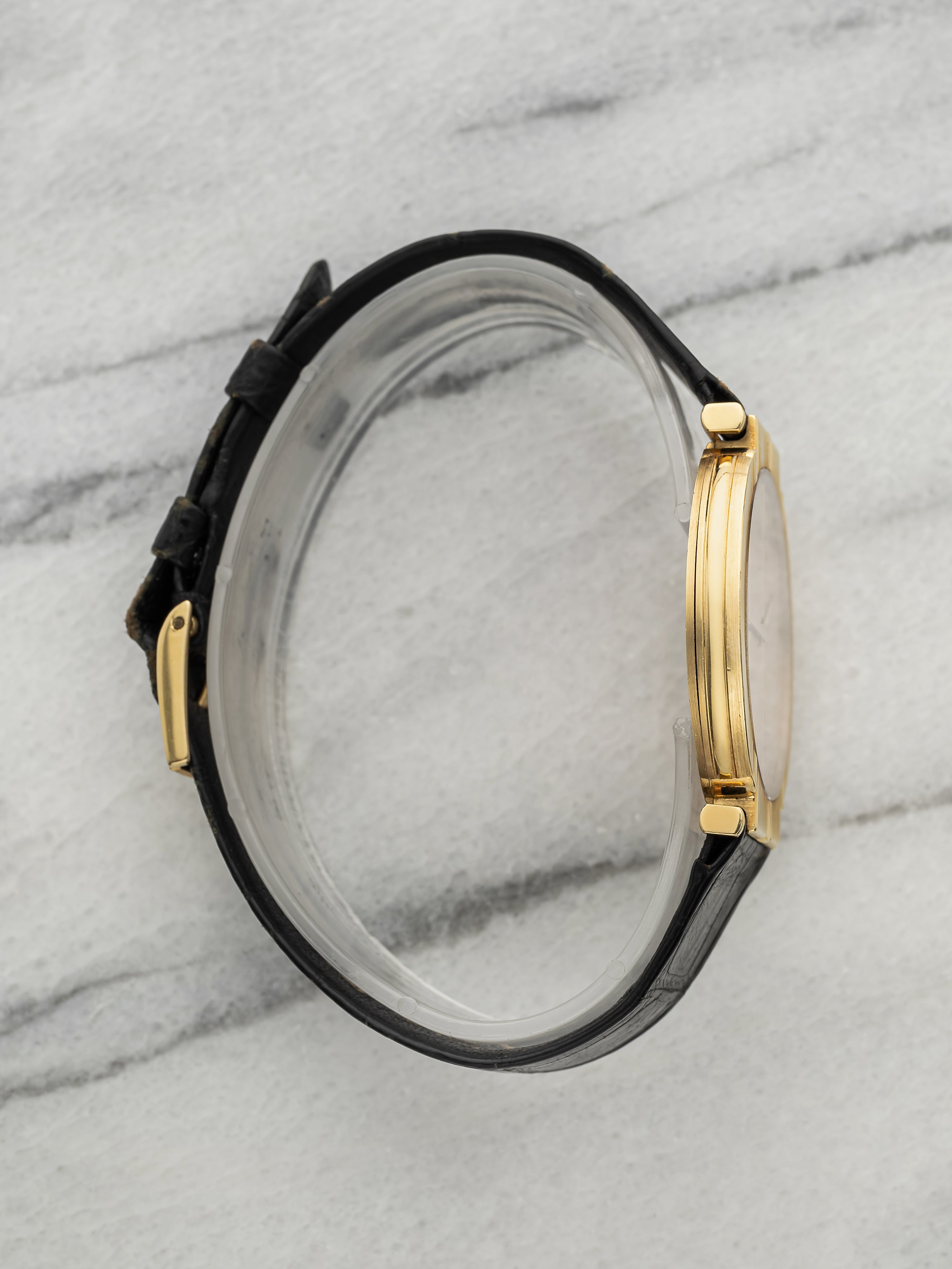 Vintage 1980s Piaget Polo 8673 18K Yellow Gold Champagne Dial Quartz 31mm