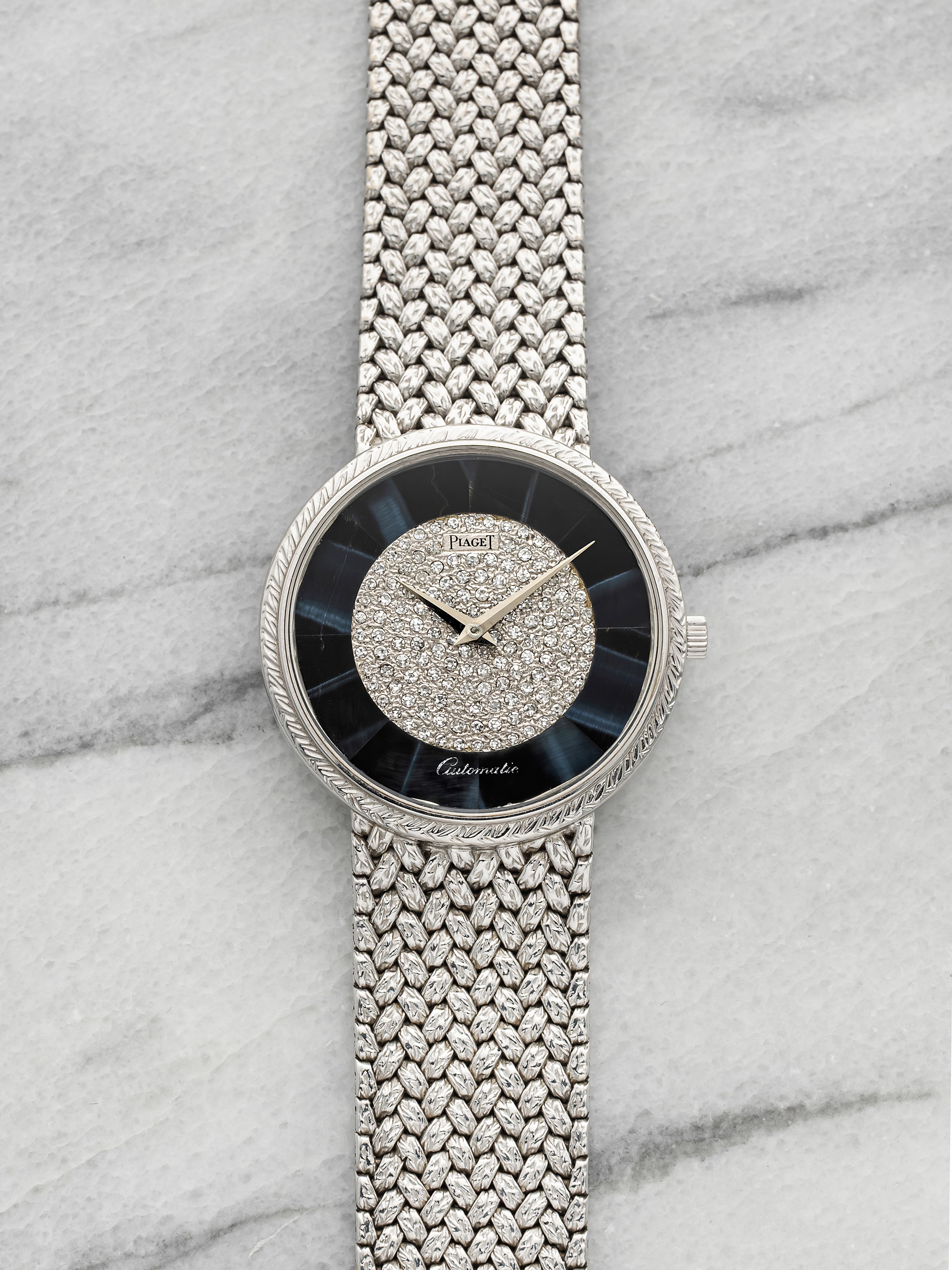 Vintage 1980s Piaget 12343D2 18K White Gold Hawkeye Diamond Dial Auto 34mm