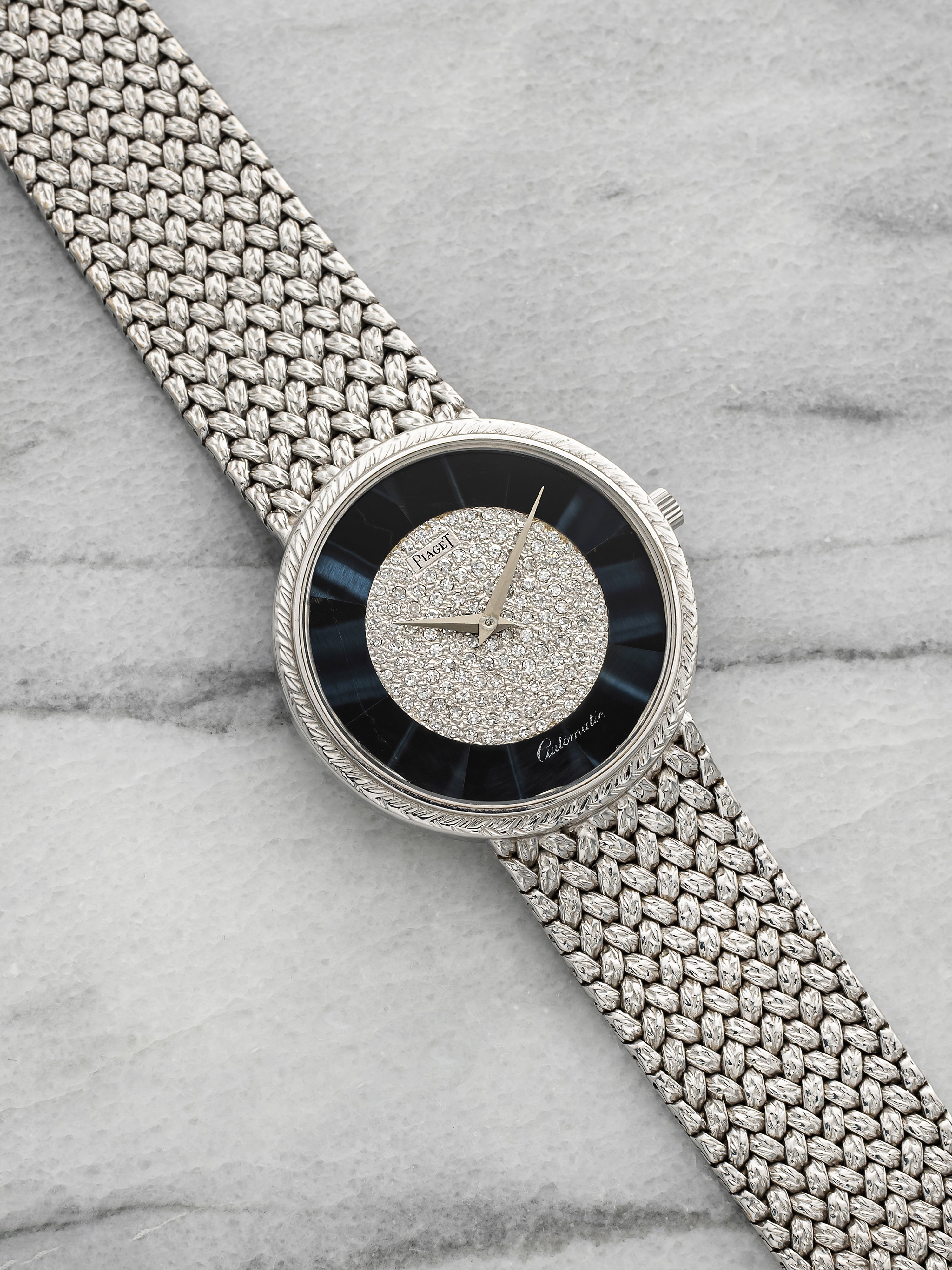 Vintage 1980s Piaget 12343D2 18K White Gold Hawkeye Diamond Dial Auto 34mm