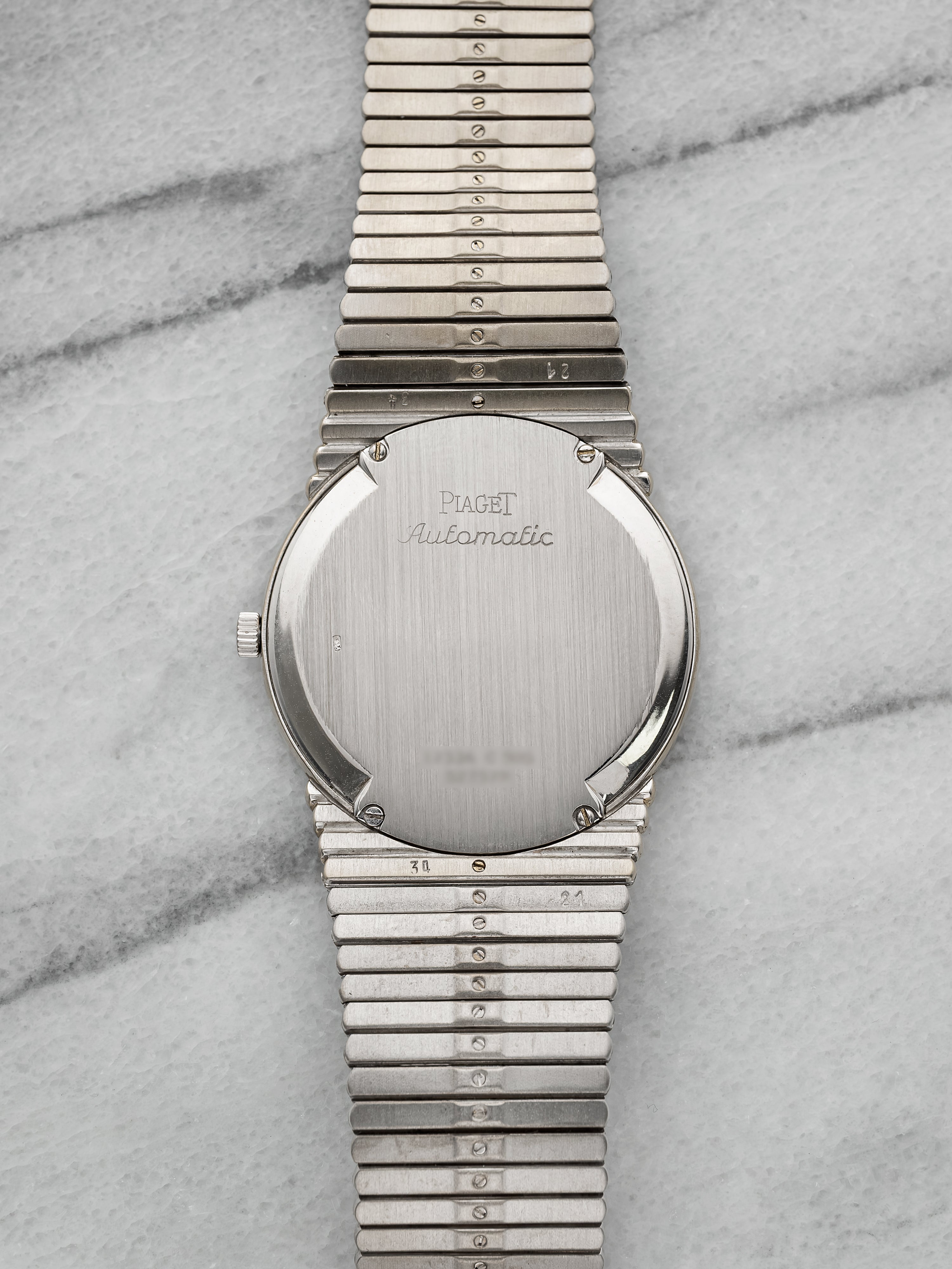 Piaget 12336 – 18K White Gold Diamond & Emerald Pave Dial